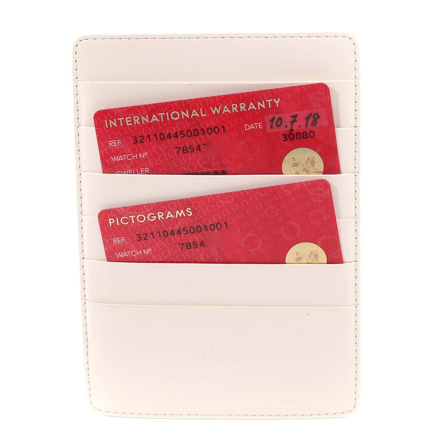 This image shows warranty and pictogram cards in a holder for the Omega Speedmaster 321.10.44.50.01.001 Men
s Stainless Steel Black Dial 321.10.44.50.01.001 Men
s Stainless Steel Black Dial watch, viewed from the front.