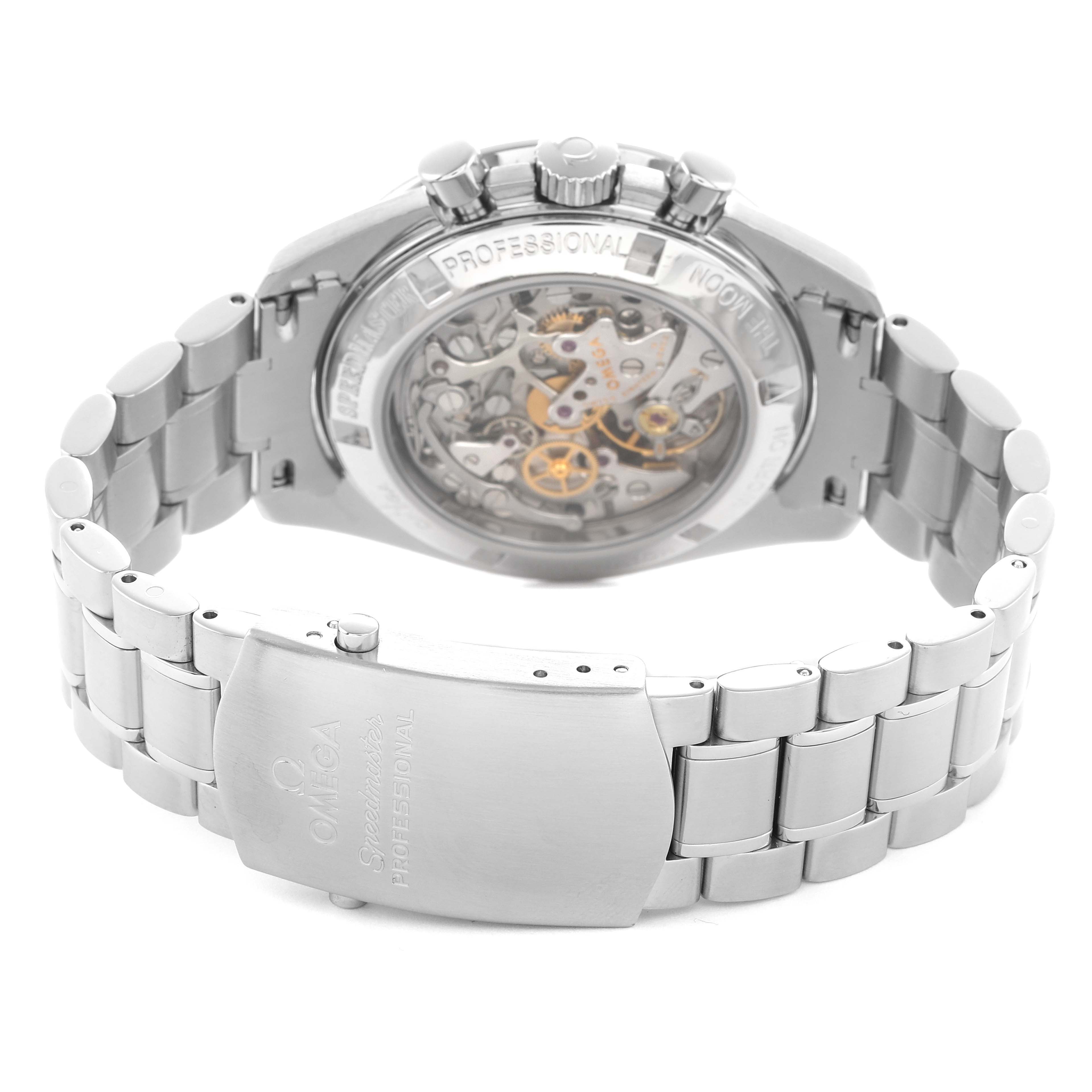 The Omega Speedmaster 3572.50.00 Men's Stainless Steel Black Dial watch is shown from the back, highlighting its transparent case back and metal bracelet clasp.