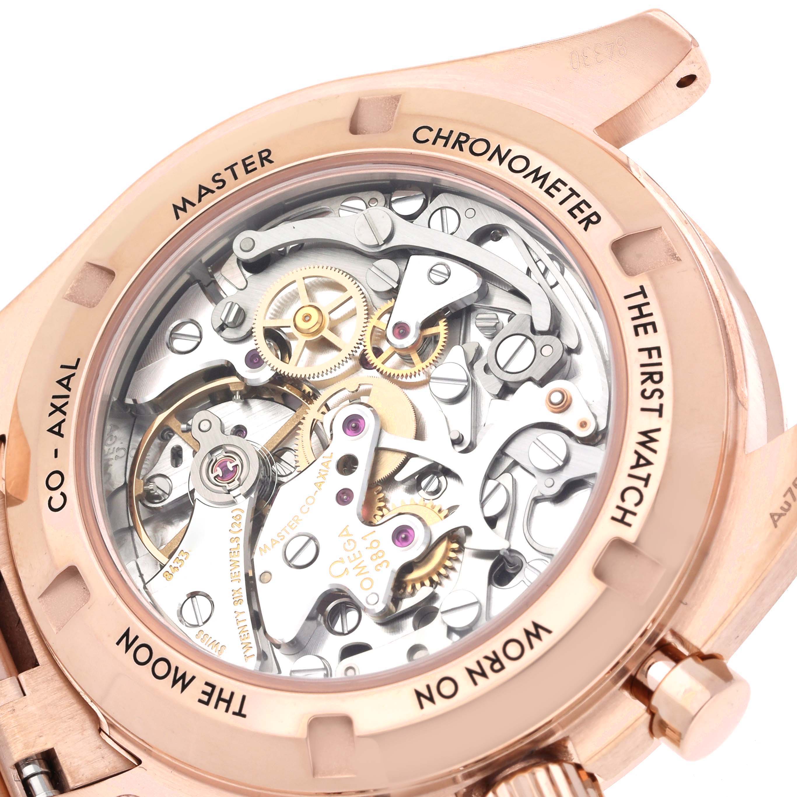 The Omega Speedmaster 310.60.42.50.01.001 Men's Rose Gold Black Dial model is shown from the back, highlighting its intricate mechanical movement through a transparent case back.