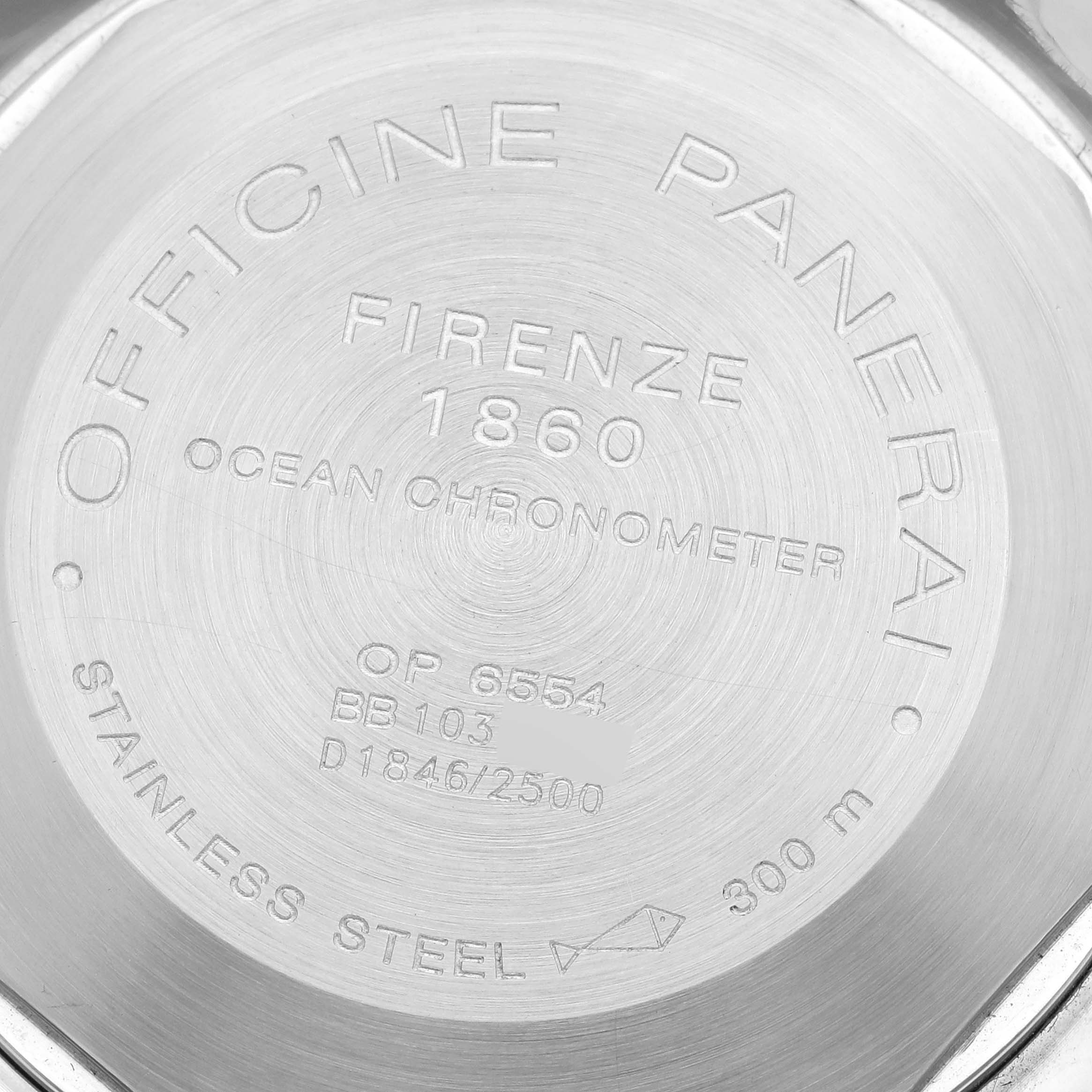 The image shows the back of a Panerai Luminor PAM00088 Men's Stainless Steel Black Dial watch, displaying engravings with details like model number and water resistance.