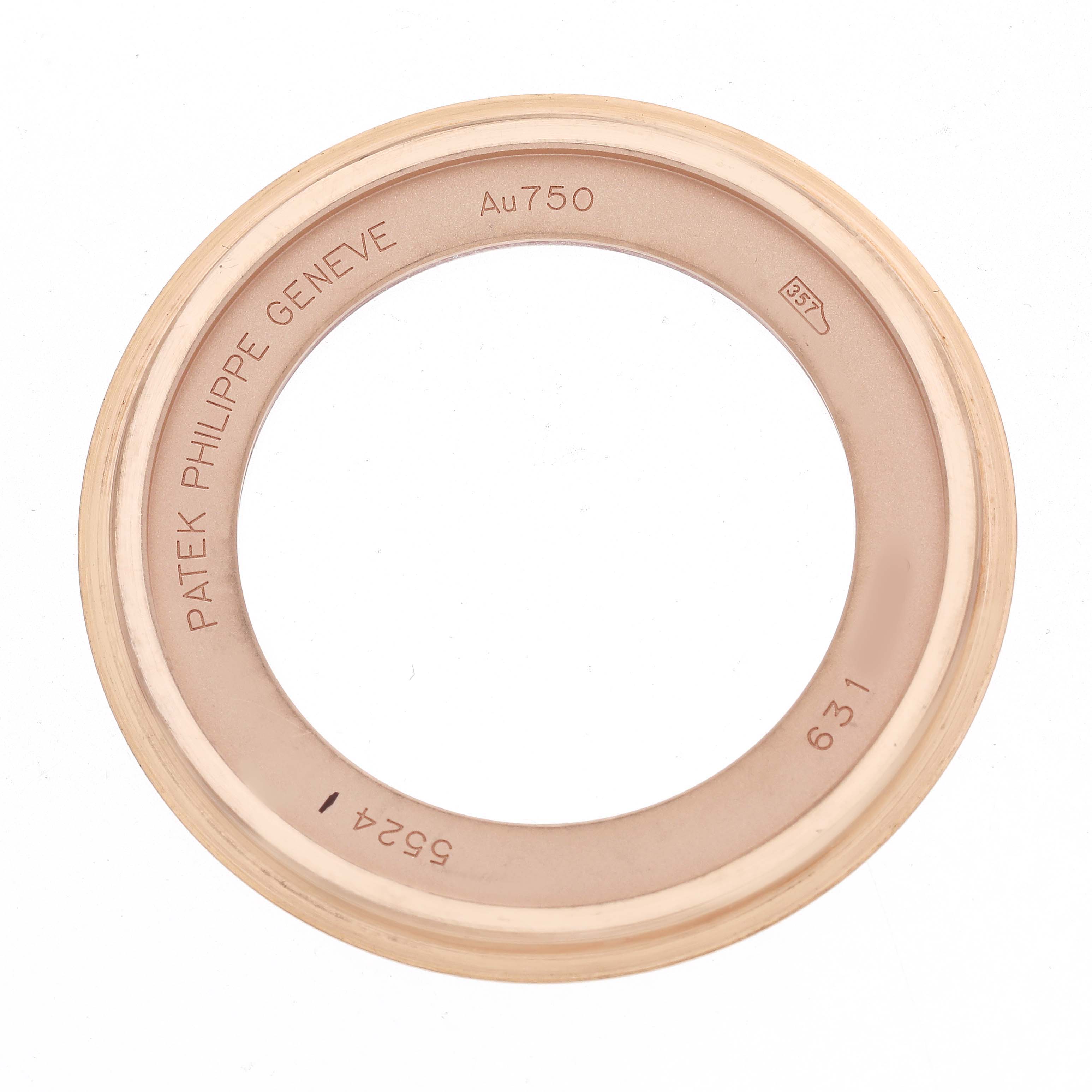 The image shows the bezel of a Patek Philippe Calatrava 5524R-001 Men's Rose Gold Brown Dial watch, viewed from the side with markings visible.