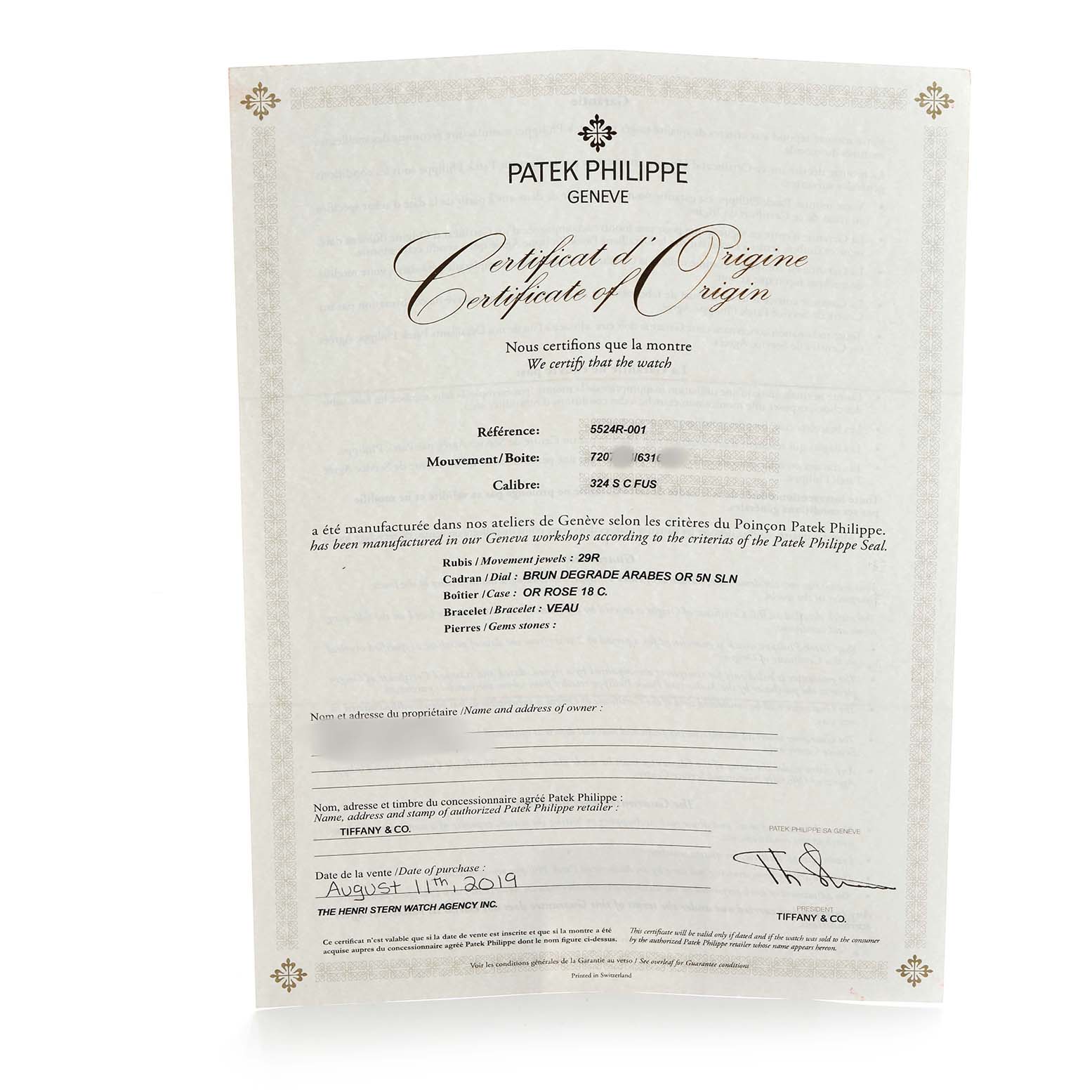 The image shows a Patek Philippe Calatrava 5524R-001 Men's Rose Gold Brown Dial certificate of origin, displayed at a slight angle.