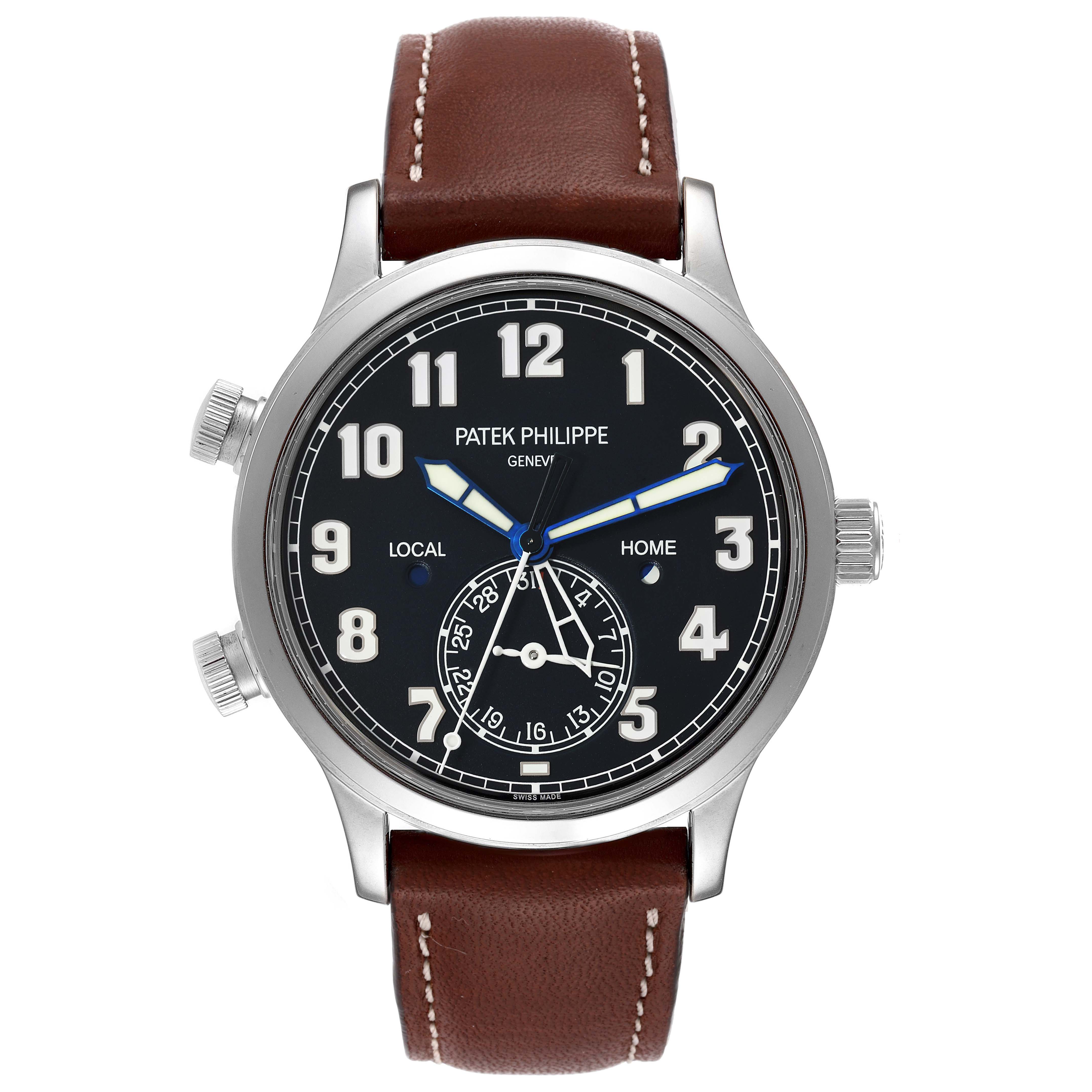 This image shows a frontal view of a Patek Philippe Calatrava 5524G Men's White Gold Blue Dial 5524G Men's White Gold Blue Dial watch, featuring a black dial, brown leather strap, and multiple subdials.