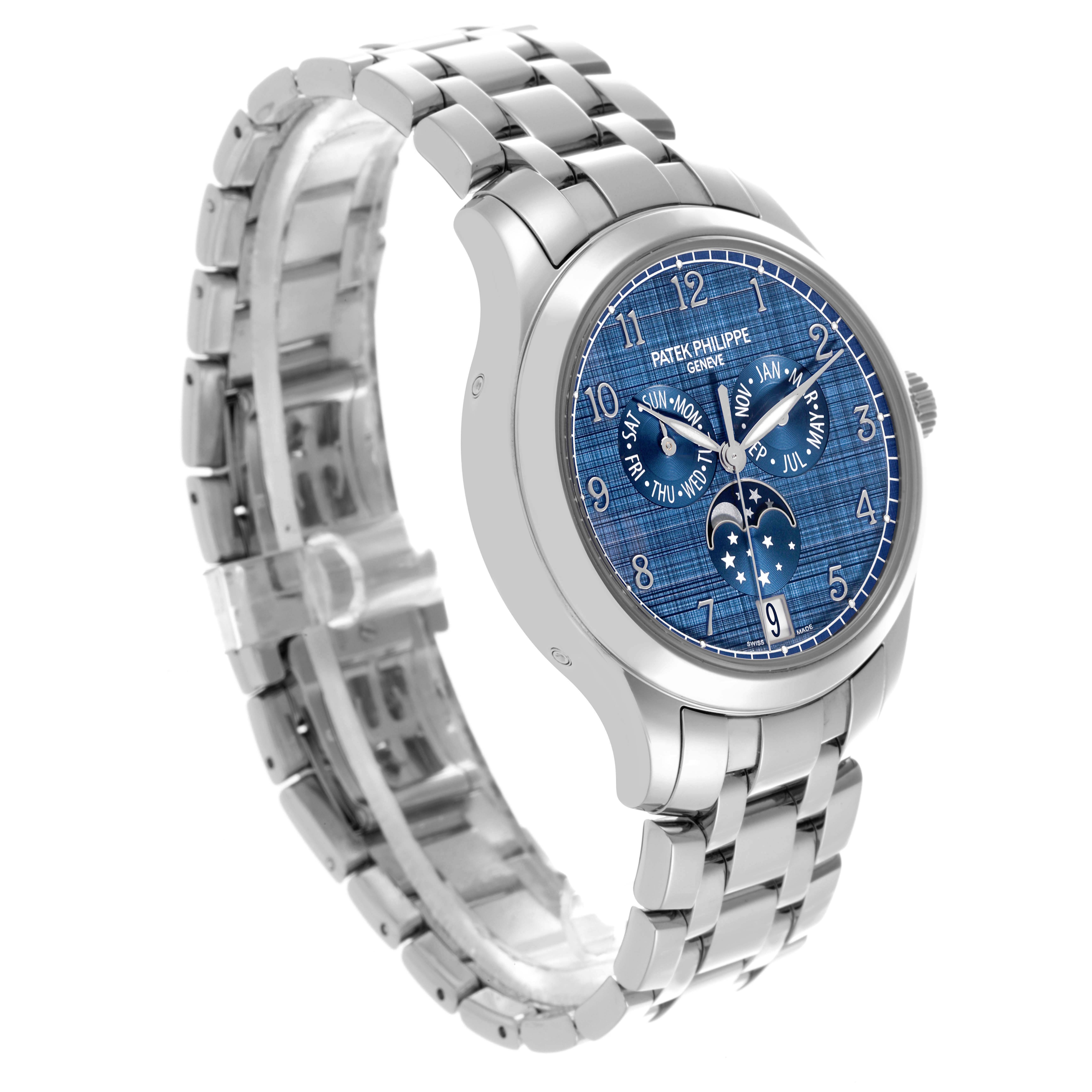 The image shows a Patek Philippe Complications 4947/1A-001 Men's Stainless Steel Blue Dial 4947/1A-001 Men's Stainless Steel Blue Dial watch at a three-quarter angle, displaying the face and stainless steel bracelet.