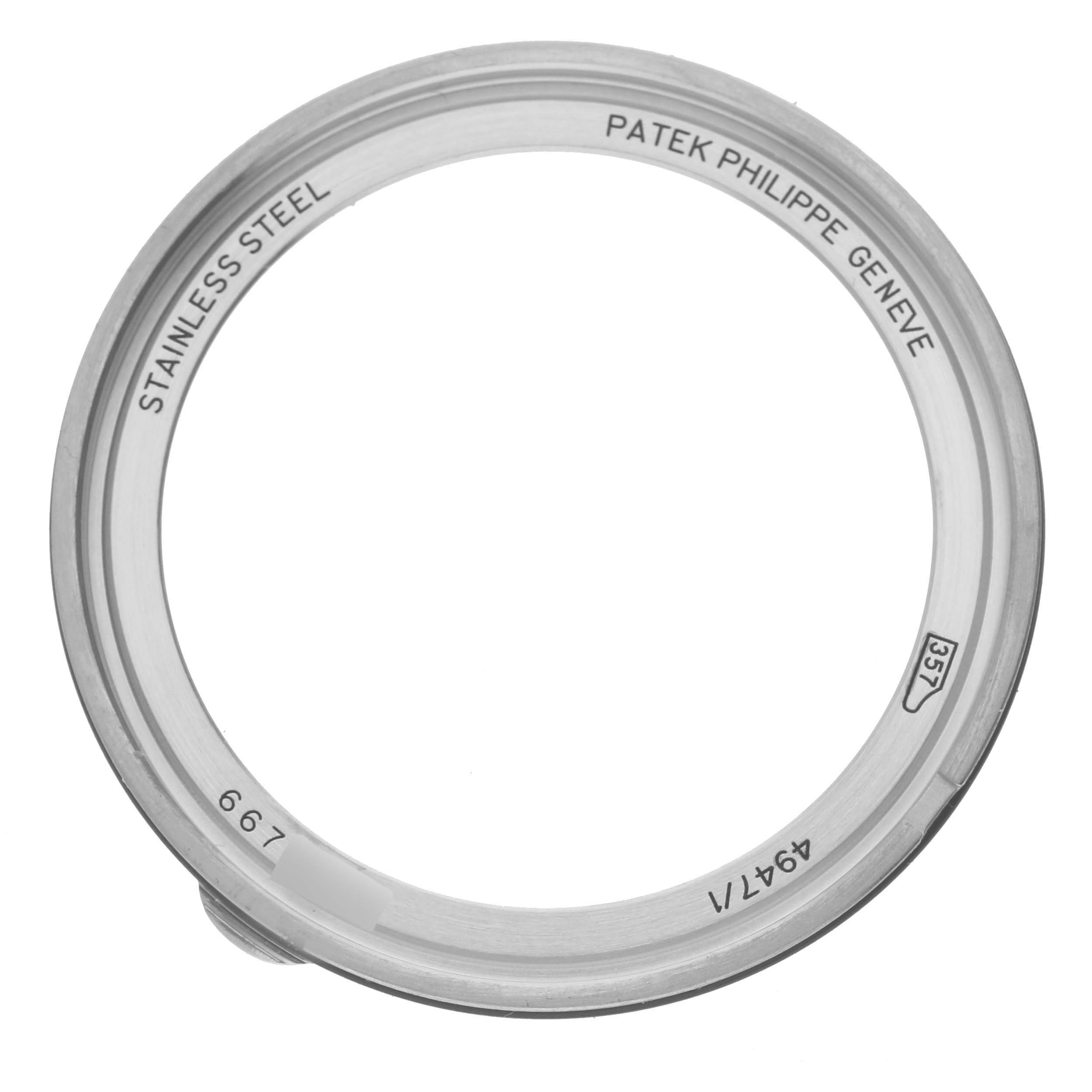 The image shows a stainless steel bezel for the Patek Philippe Complications 4947/1A-001 Men's Stainless Steel Blue Dial 4947/1A-001 Men's Stainless Steel Blue Dial model, viewed from above.