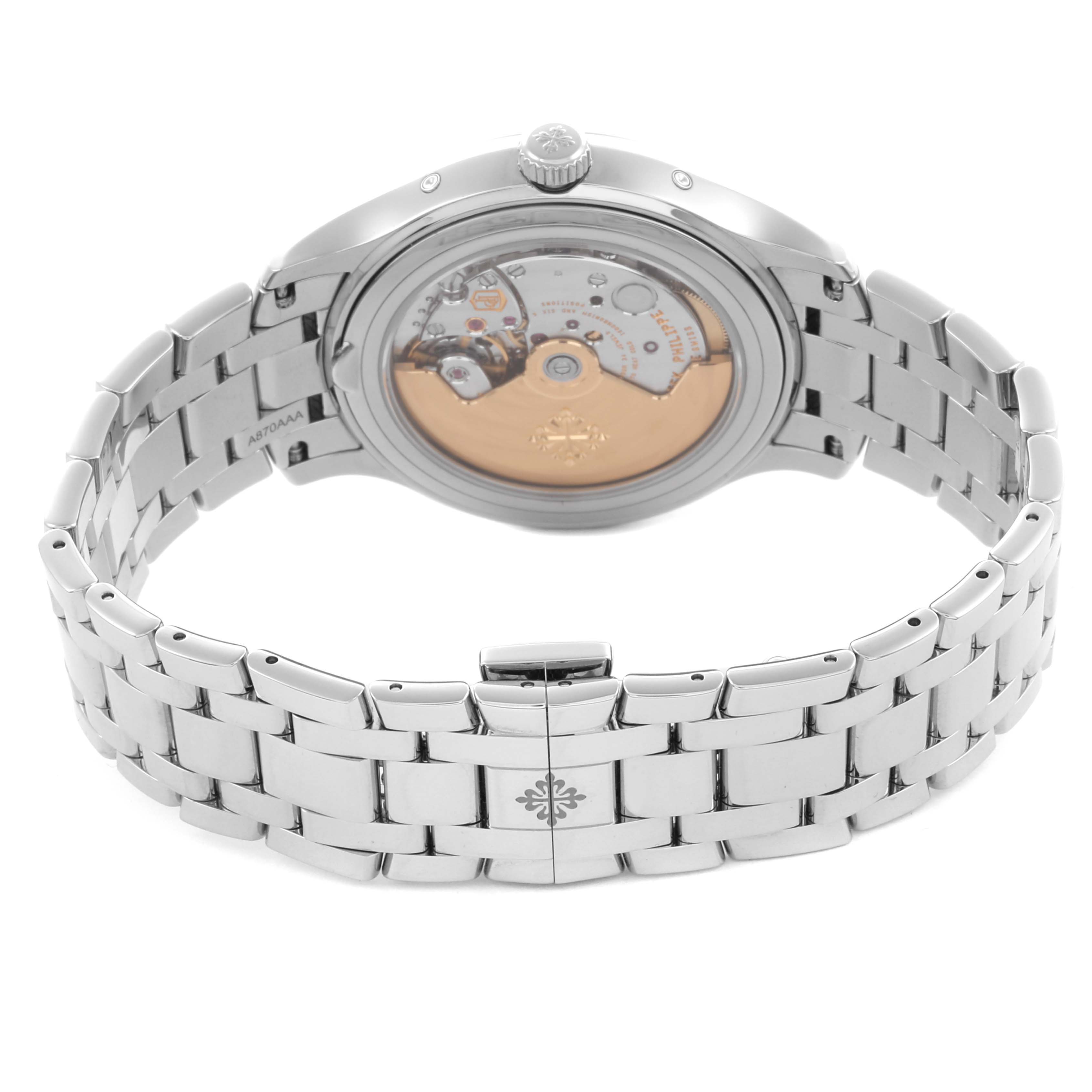 The Patek Philippe Complications 4947/1A-001 Men's Stainless Steel Blue Dial 4947/1A-001 Men's Stainless Steel Blue Dial watch is shown from the back, highlighting its see-through case back and metal bracelet.