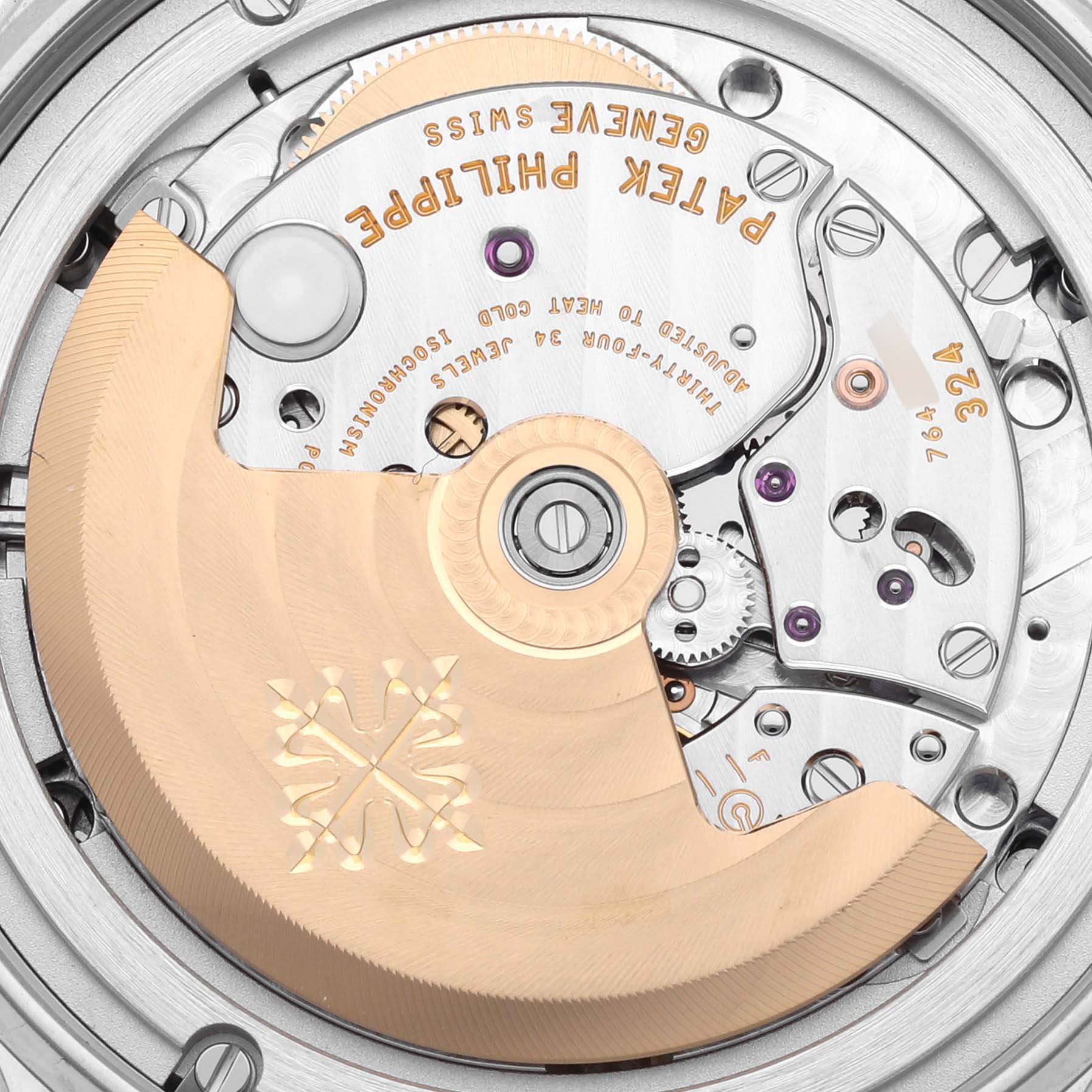 This image shows the movement and intricate mechanics of a Patek Philippe Complications 4947/1A-001 Men's Stainless Steel Blue Dial 4947/1A-001 Men's Stainless Steel Blue Dial watch from a top-down angle.