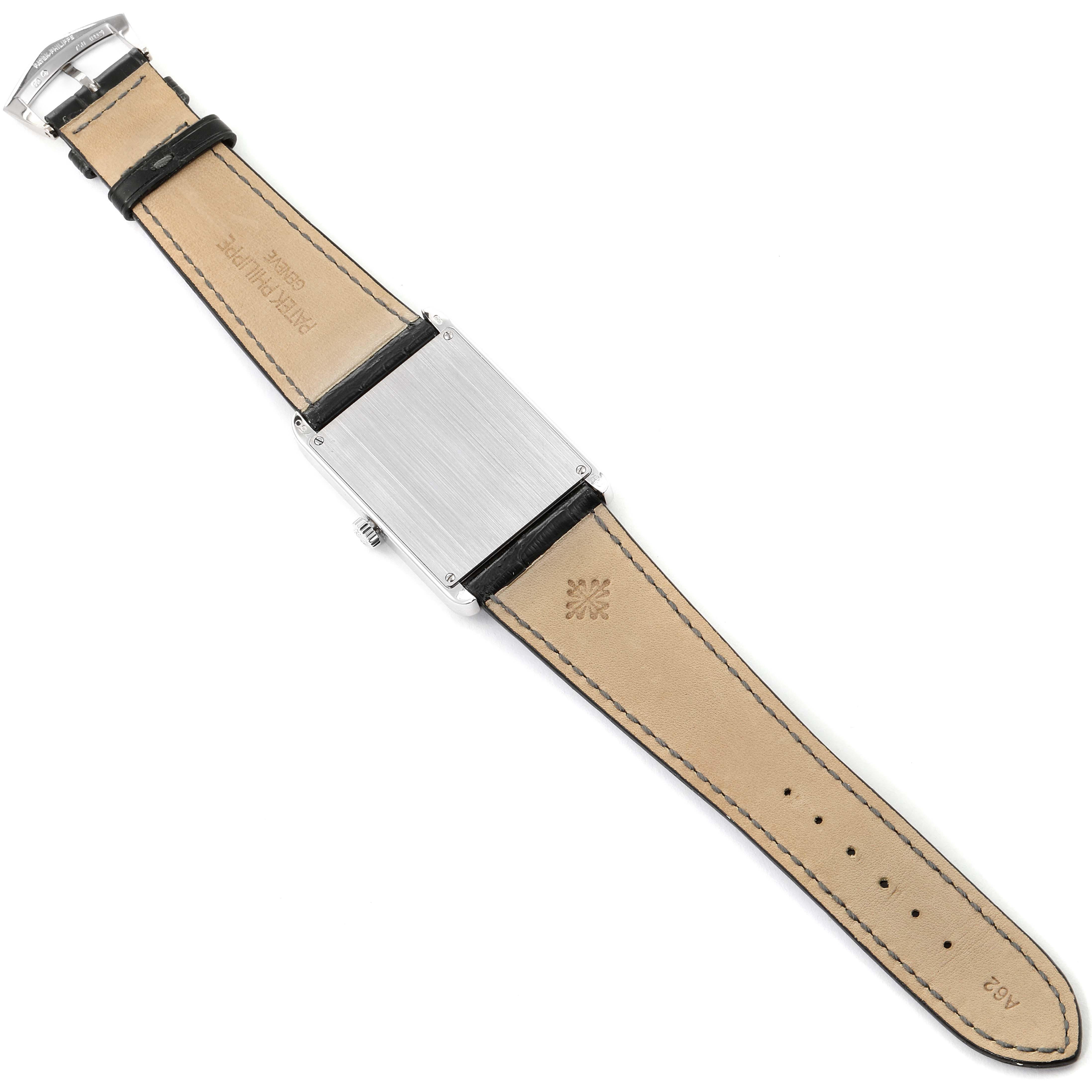 The image shows the back side of a Patek Philippe Gondolo 5109 Men's White Gold Silver Dial 5109 Men's White Gold Silver Dial watch, including the caseback, leather strap, and buckle.