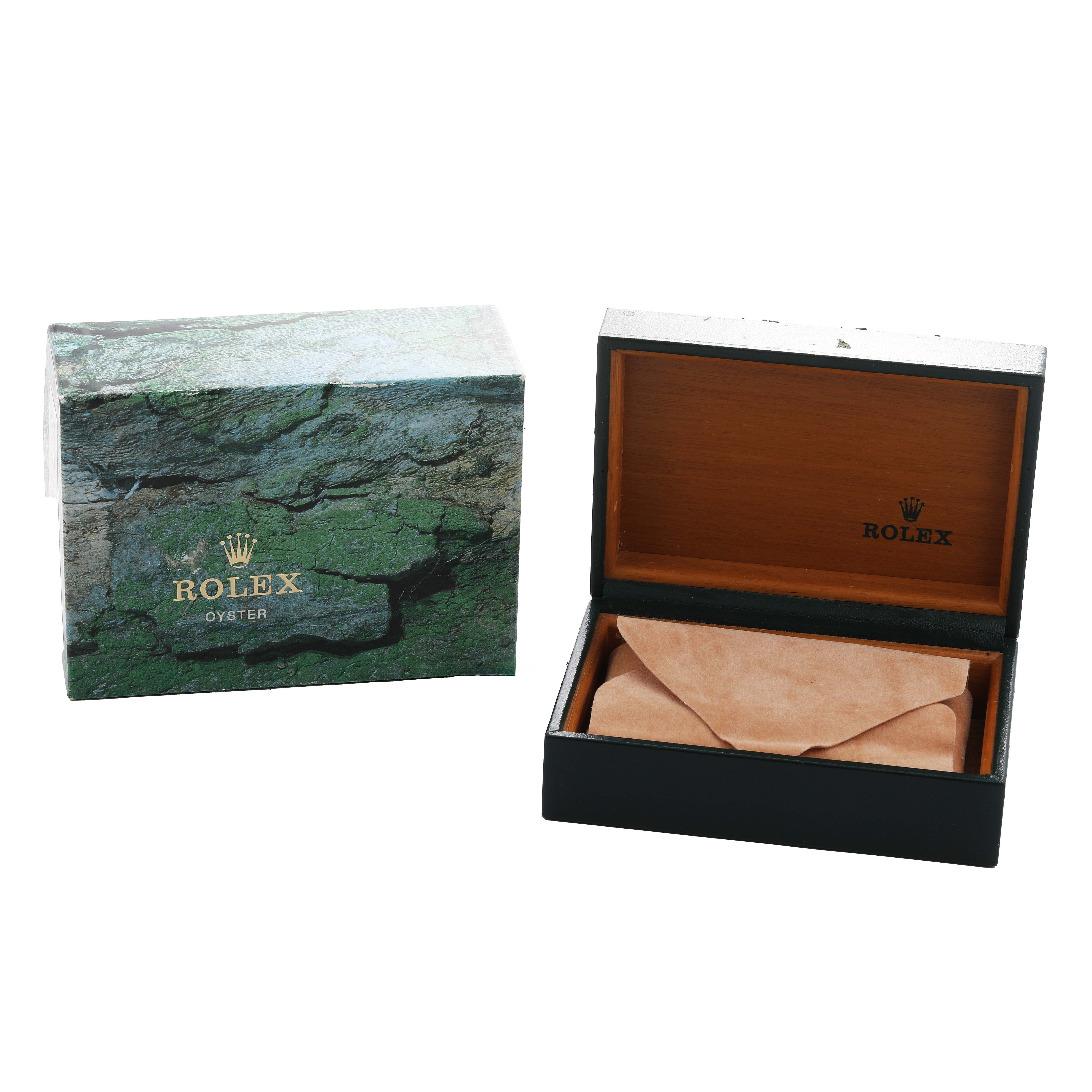 The image shows the packaging for a Rolex Air-King 14010 Men's Stainless Steel Black Dial watch, including an open wooden box and outer green box.