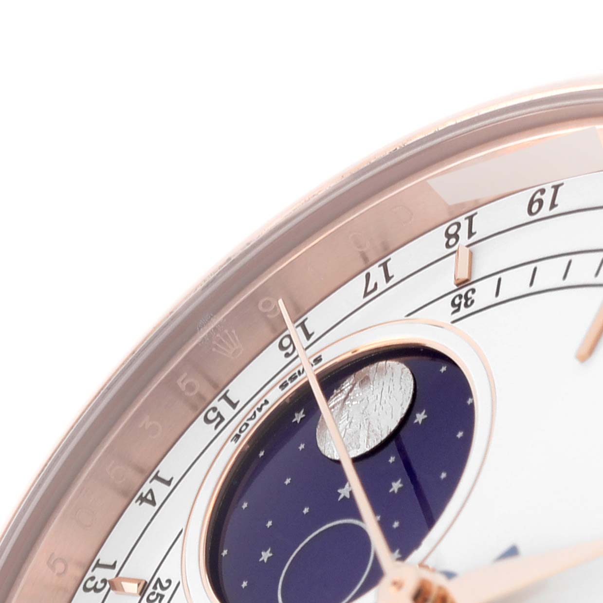 The image shows a close-up of the dial on a Rolex Cellini 50535 Men's Rose Gold White Dial 50535 Men's Rose Gold White Dial watch, highlighting the Moonphase indicator and part of the hour markers.