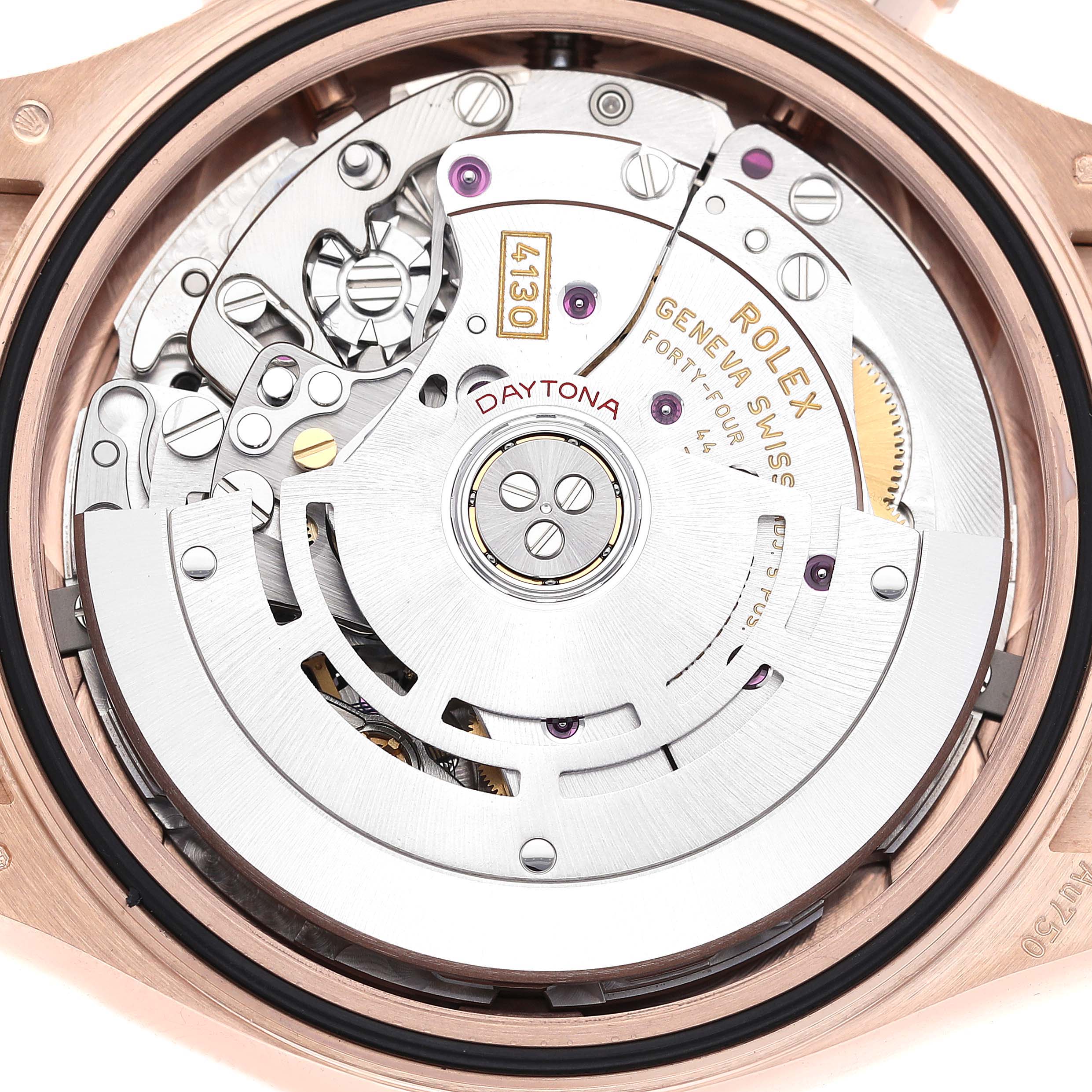 The image shows the movement mechanism of a Rolex Daytona 116515LN Men's Rose Gold Champagne Dial 116515LN Men's Rose Gold Champagne Dial watch from a back angle, highlighting its intricate internal components.