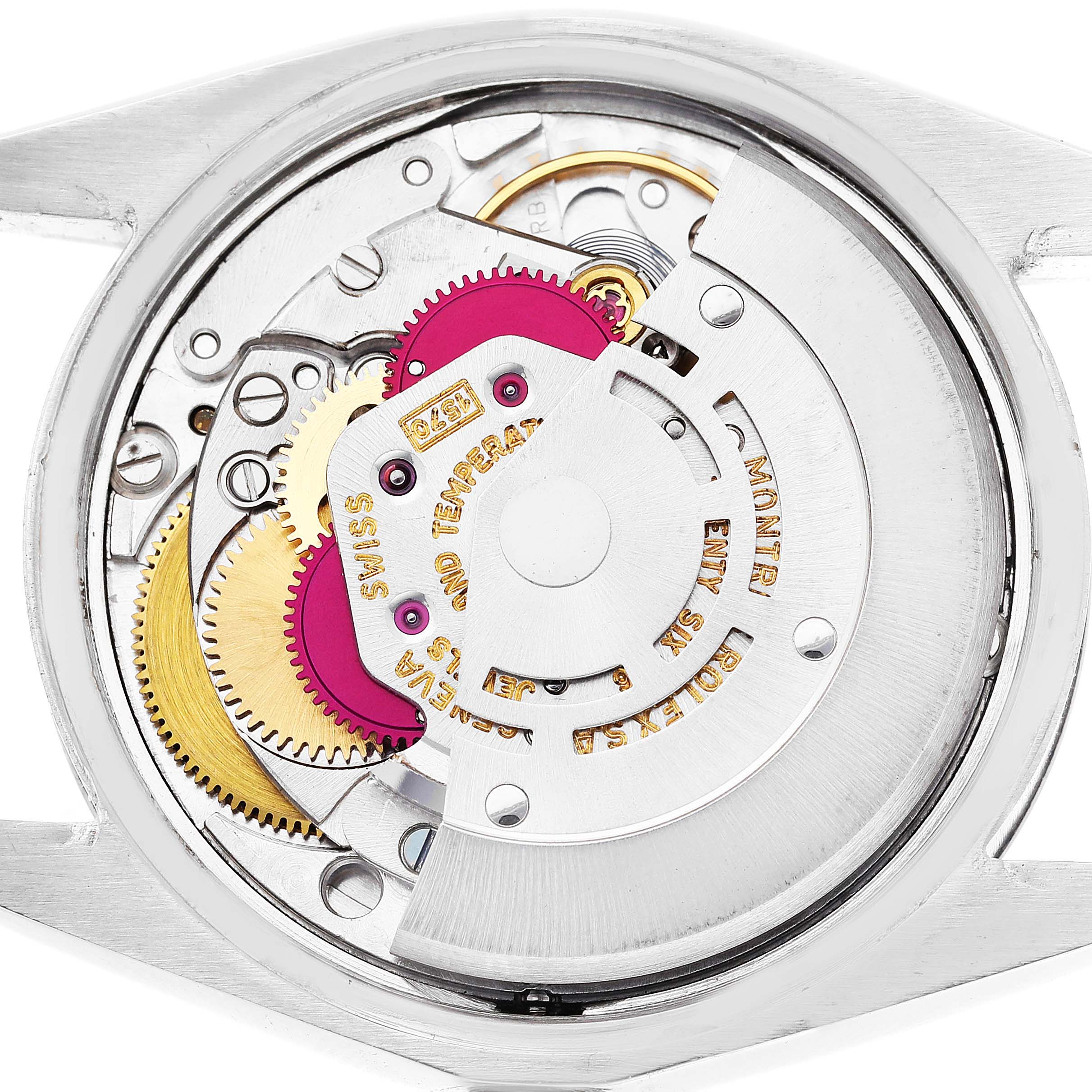 The image shows the intricate internal mechanism of the Rolex Vintage Collection 1500 Men's Stainless Steel Blue Dial 1500 Men's Stainless Steel Blue Dial watch from a back angle.