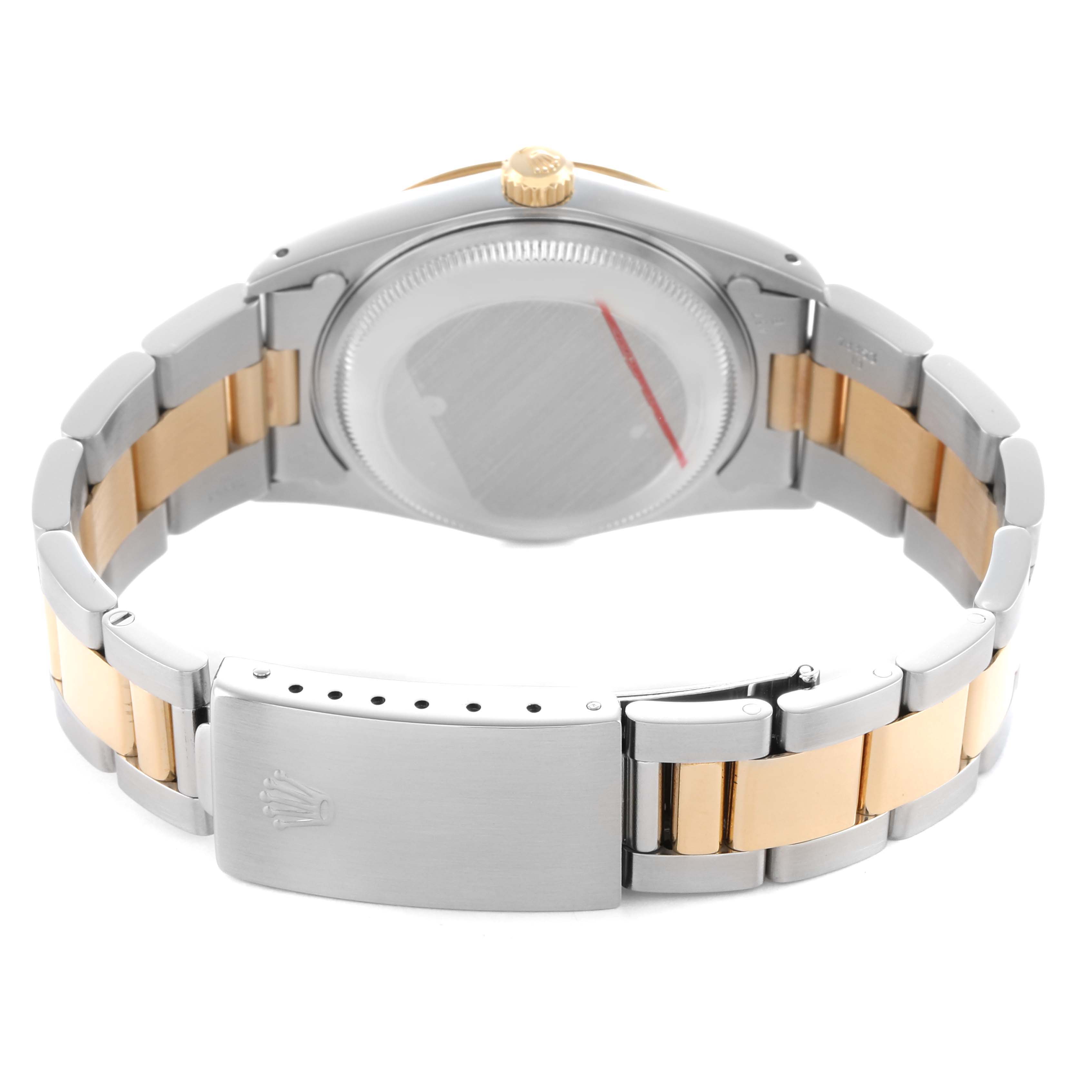 The image shows the back of a Rolex Date 15223 Men's Steel and Gold (two tone) Champagne Dial model watch, highlighting the bracelet, clasp, and case back.