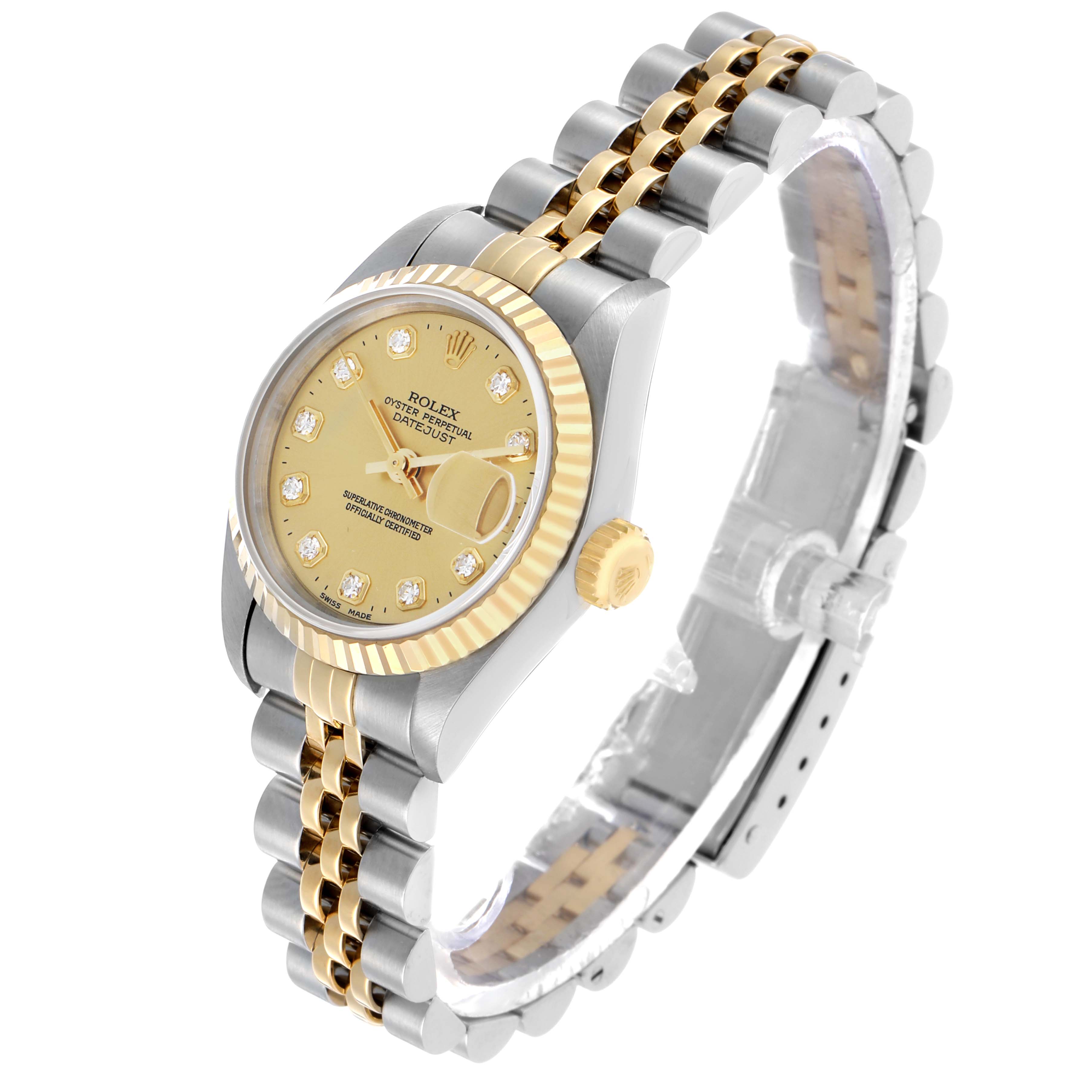 The Rolex Datejust 69173 Women's Steel and Gold (two tone) Champagne Dial watch is shown at an angled side view, highlighting its gold and silver band, fluted bezel, and diamond hour markers.