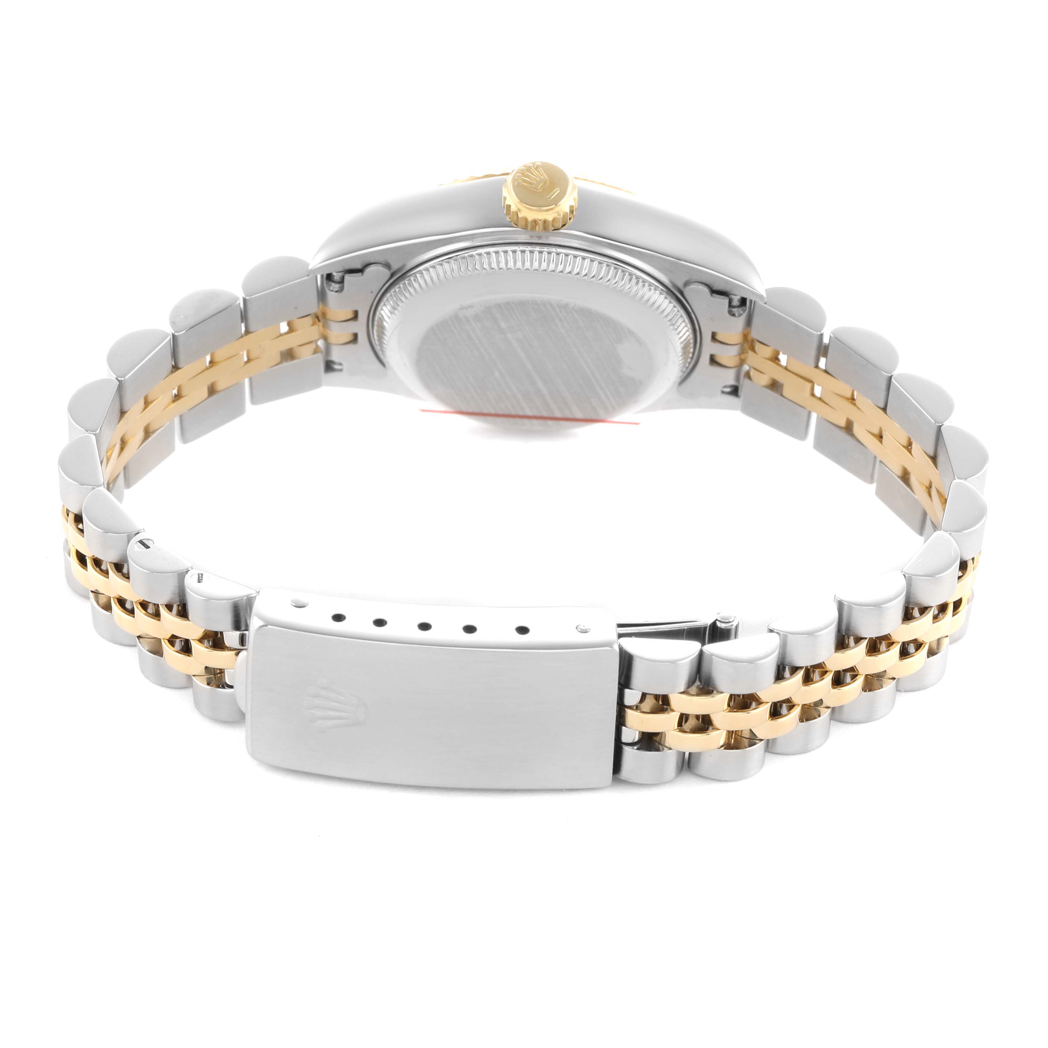 The image shows the back view of a Rolex Datejust 69173 Women's Steel and Gold (two tone) Champagne Dial, highlighting the bracelet, case back, and crown.