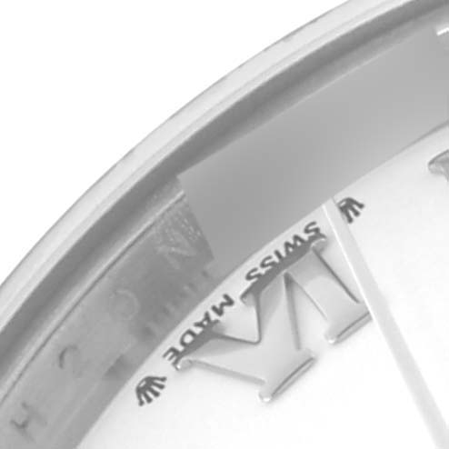 The image shows a detailed close-up of the Datejust model by Rolex, focusing on the dial edge and part of the bezel.