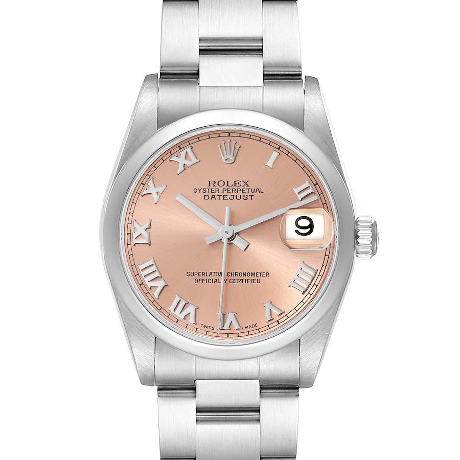 The Rolex Mid-Size watch is shown from a frontal angle, displaying the dial, hands, date, crown, and bracelet.