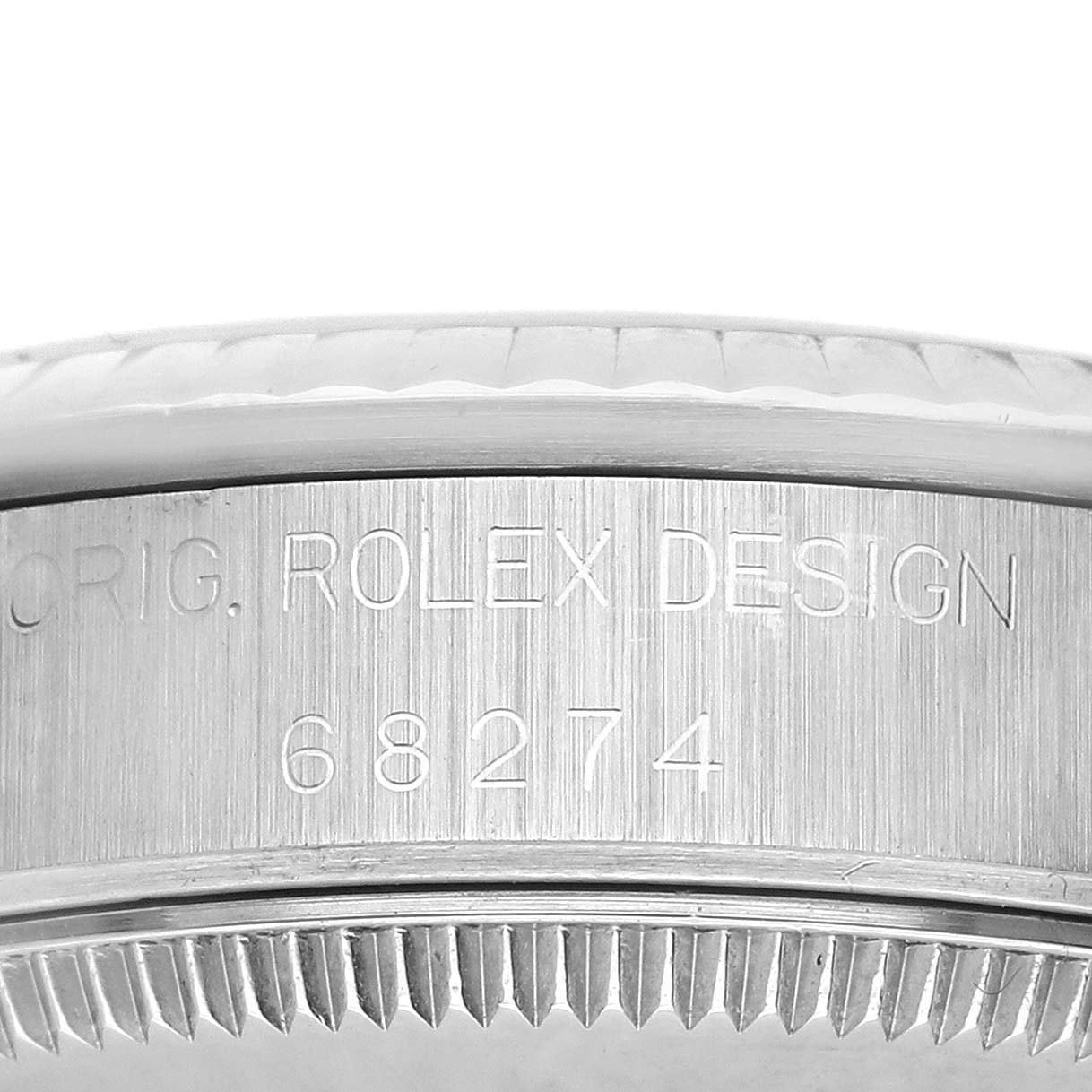 The image shows the side profile and engraved reference number of the Rolex Mid-Size 68274 Women's Stainless Steel Silver Dial 68274 Women's Stainless Steel Silver Dial model.