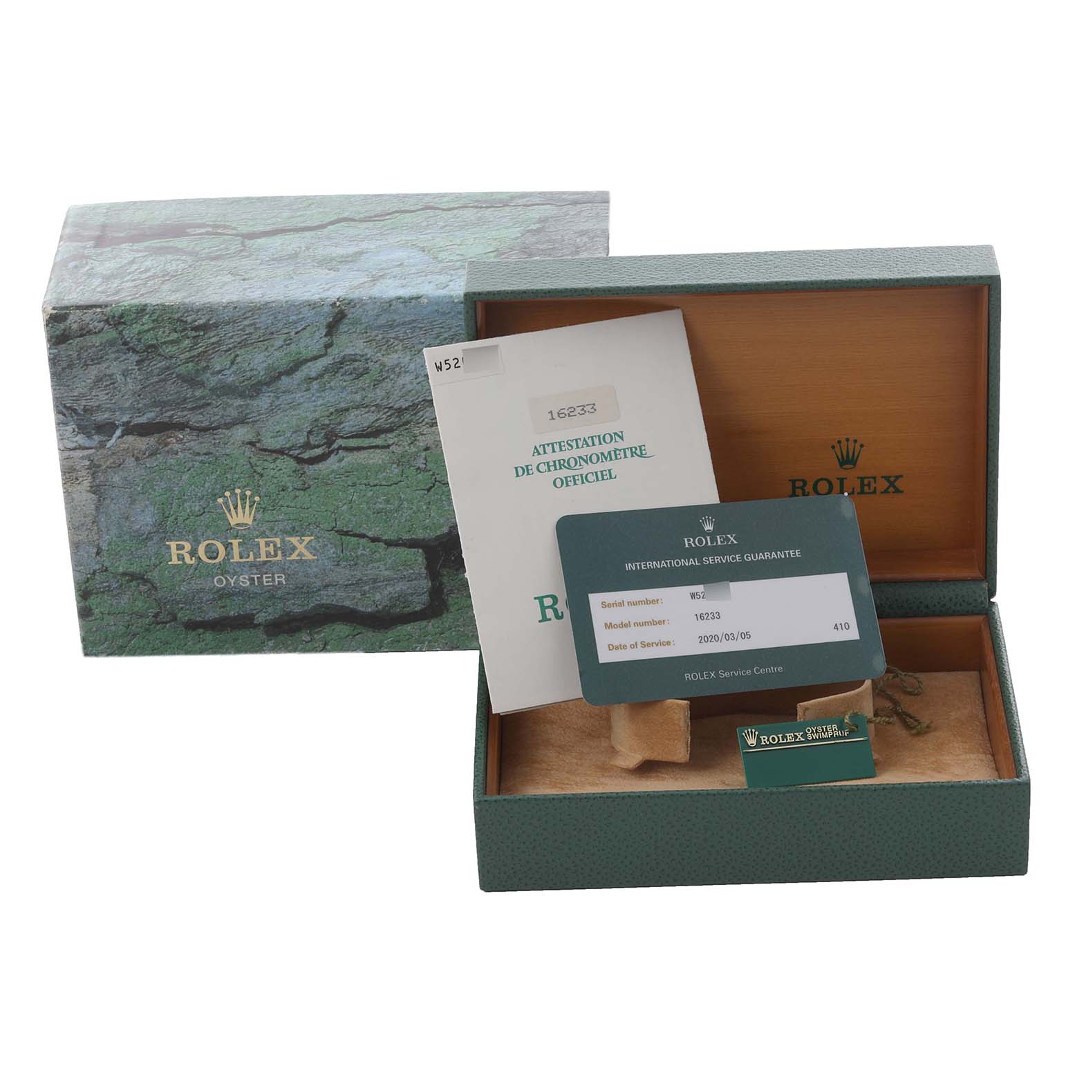 The image shows the packaging, guarantee card, and documentation for a Rolex Datejust 16233 Men's Steel and Gold (two tone) Grey Dial 16233 Men's Steel and Gold (two tone) Grey Dial model, viewed from the top.