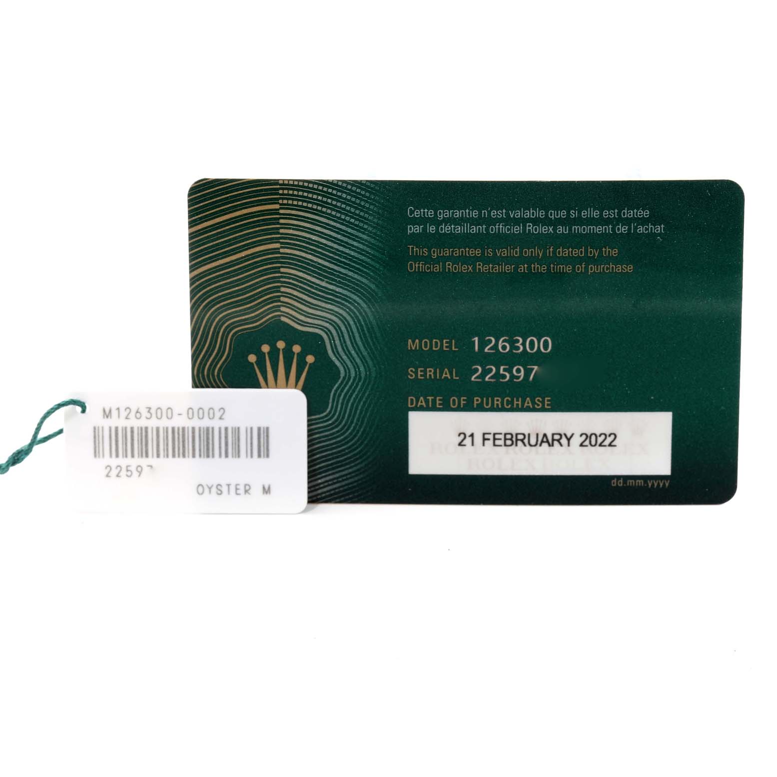 The image shows a warranty card and a tag for the Rolex Datejust 41 126300 Men's Stainless Steel Blue Dial 126300 Men's Stainless Steel Blue Dial model.