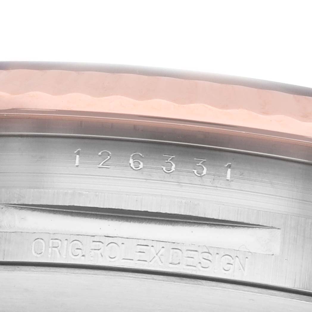 The image shows a close-up of the Rolex Datejust 41 126331 Men's Steel and Gold (two tone) Pink Dial's side, highlighting the model number and "Orig. Rolex Design" engraving.