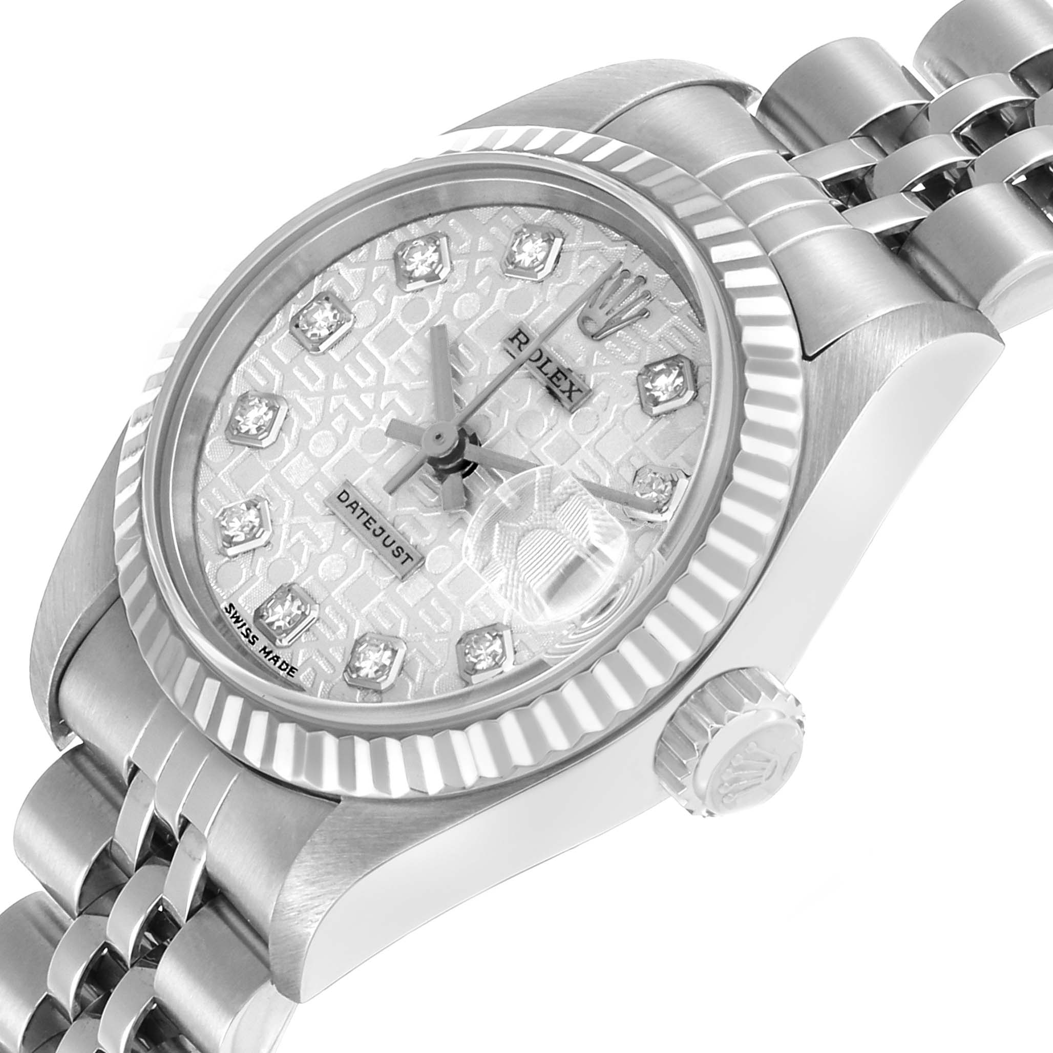 The Rolex Datejust 79174 Women's Stainless Steel Silver Dial watch is shown from a slight angle highlighting the dial, bezel, crown, and part of the bracelet.