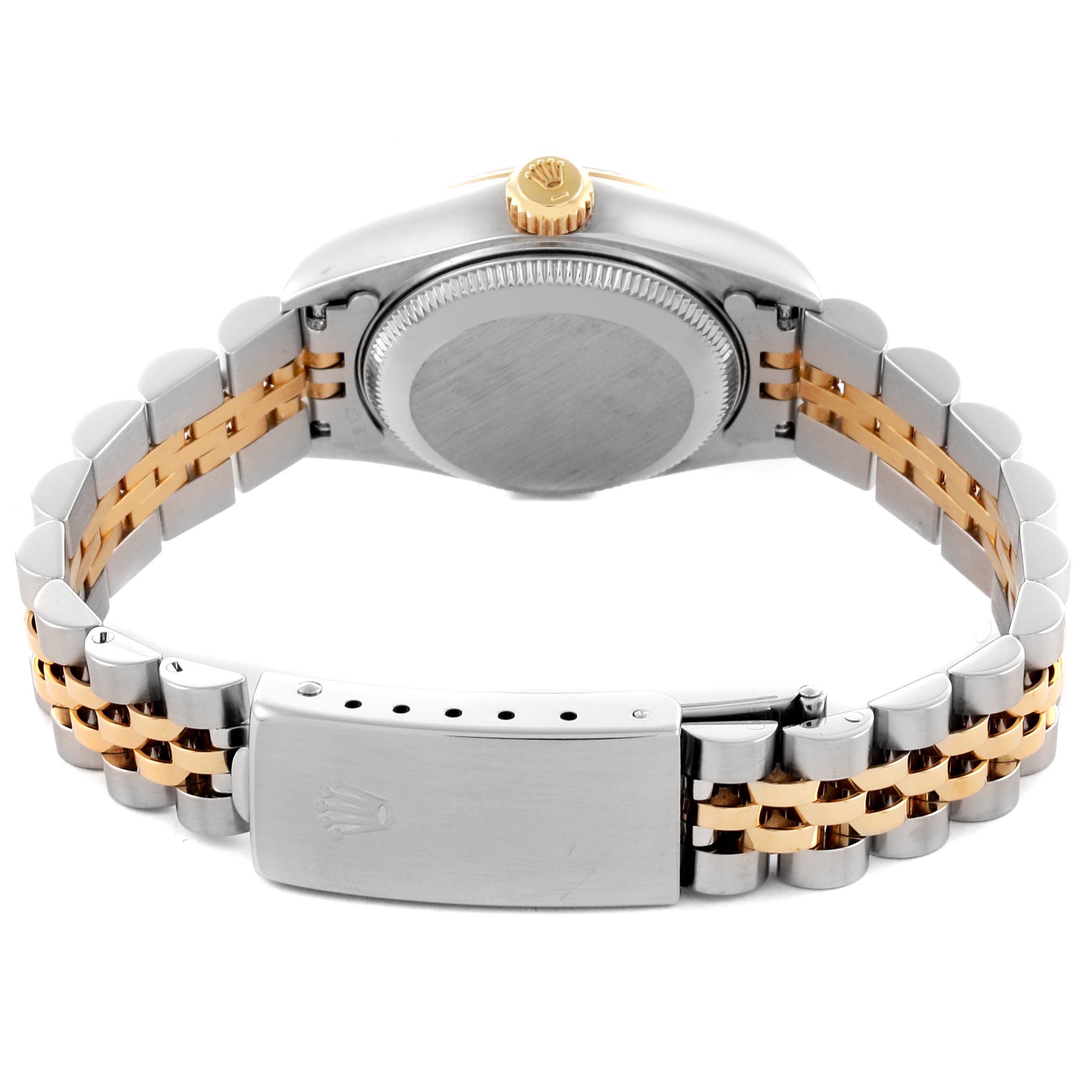 The Rolex Datejust 69173 Women's Steel and Gold (two tone) Black Dial 69173 Women's Steel and Gold (two tone) Black Dial is shown from the back, highlighting the case, crown, and two-tone bracelet with clasp.