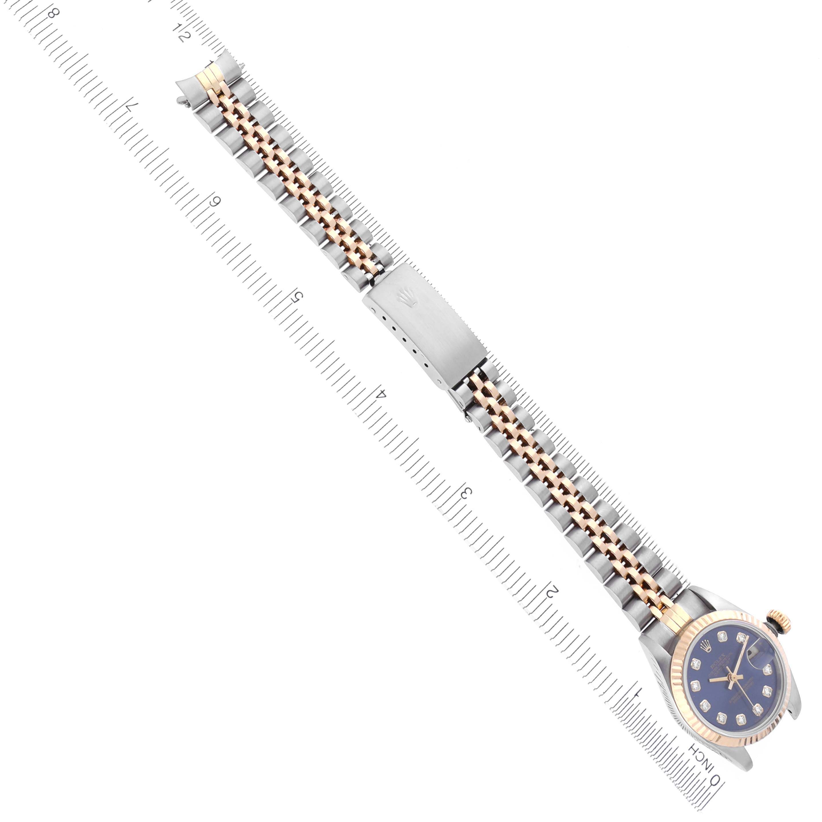 The Rolex Datejust 69173 Women's Steel and Gold (two tone) Blue Dial 69173 Women's Steel and Gold (two tone) Blue Dial watch is shown from a top view, displaying the face and full metal bracelet with a clasp.