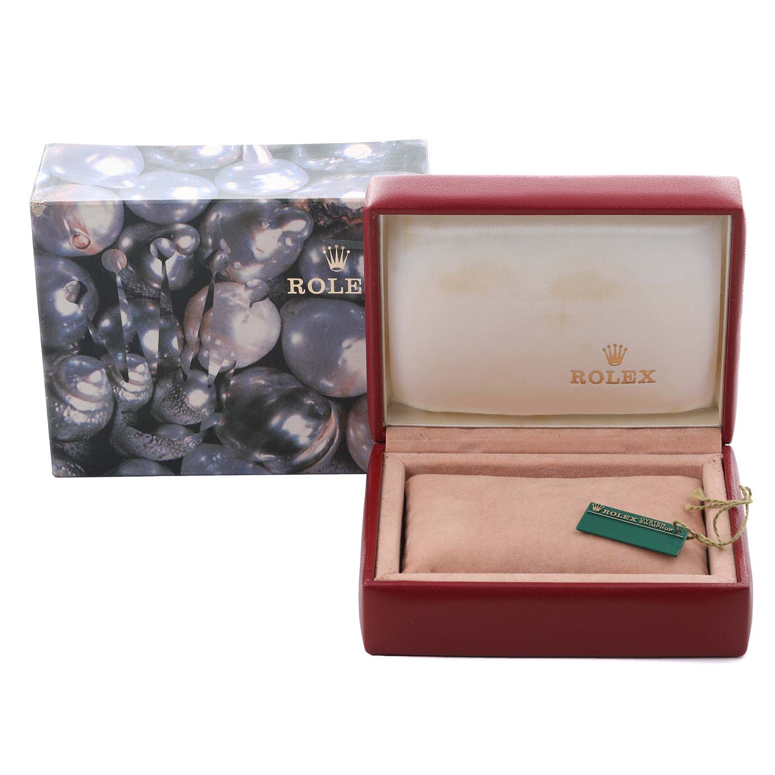 The image shows an open Rolex Datejust 69173 Women's Steel and Gold (two tone) Blue Dial 69173 Women's Steel and Gold (two tone) Blue Dial watch box with a cushion and tag, and a decorative outer box.