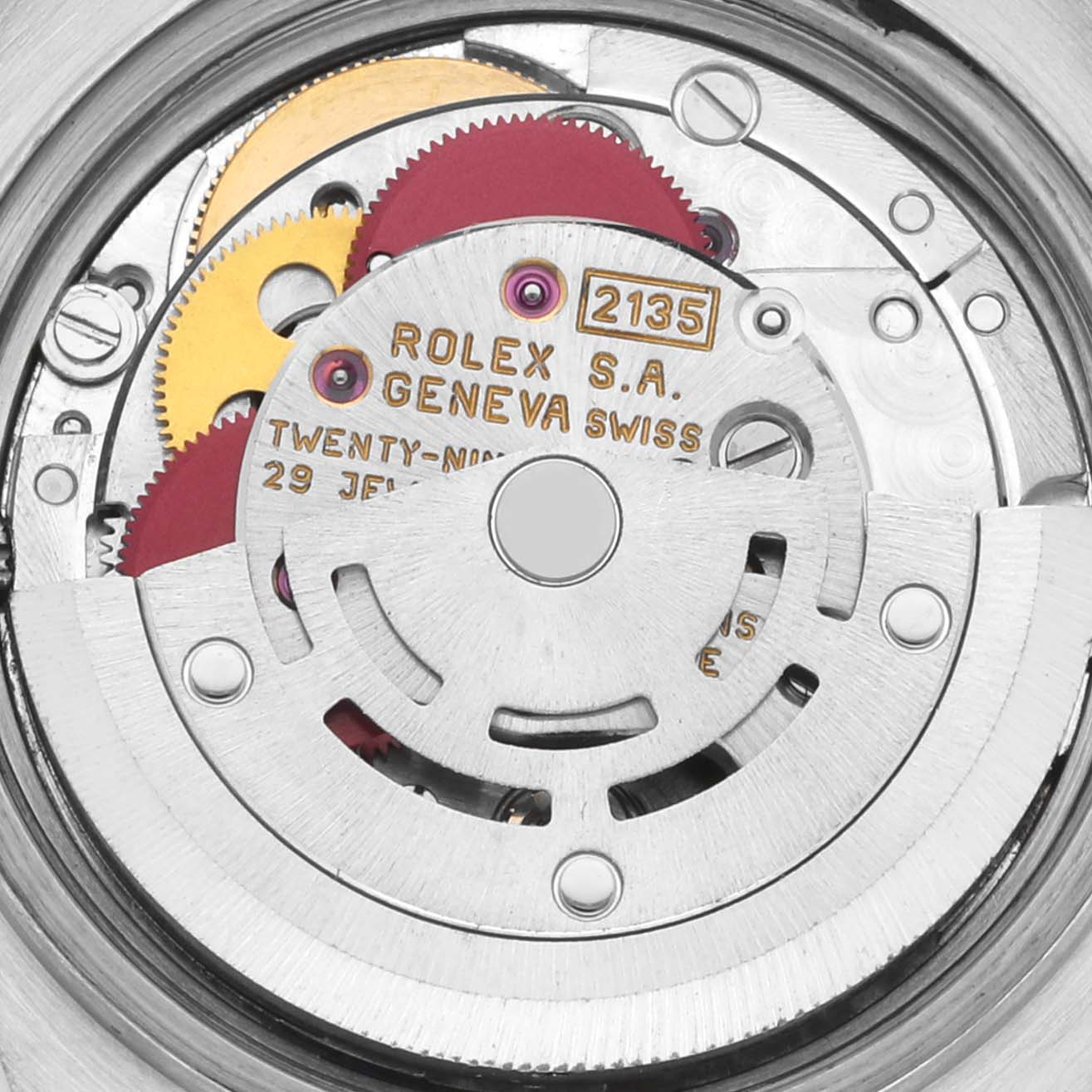 The image shows the internal movement of a Rolex Datejust 69173 Women's Steel and Gold (two tone) Blue Dial 69173 Women's Steel and Gold (two tone) Blue Dial, highlighting gears and the rotor from a top-down angle.