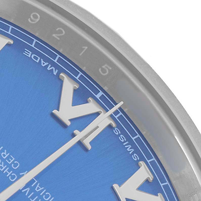 The image shows a close-up of a Rolex Datejust 41 116334 Men's Stainless Steel Blue Dial watch dial, focusing on the blue background and Roman numerals near the edge.