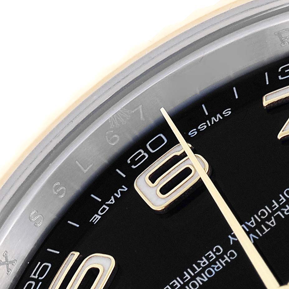 The image shows a close-up of the dial and markers of the Rolex Datejust 41 116333 Men's Steel and Gold (two tone) Black Dial 116333 Men's Steel and Gold (two tone) Black Dial, highlighting numbers and text details.