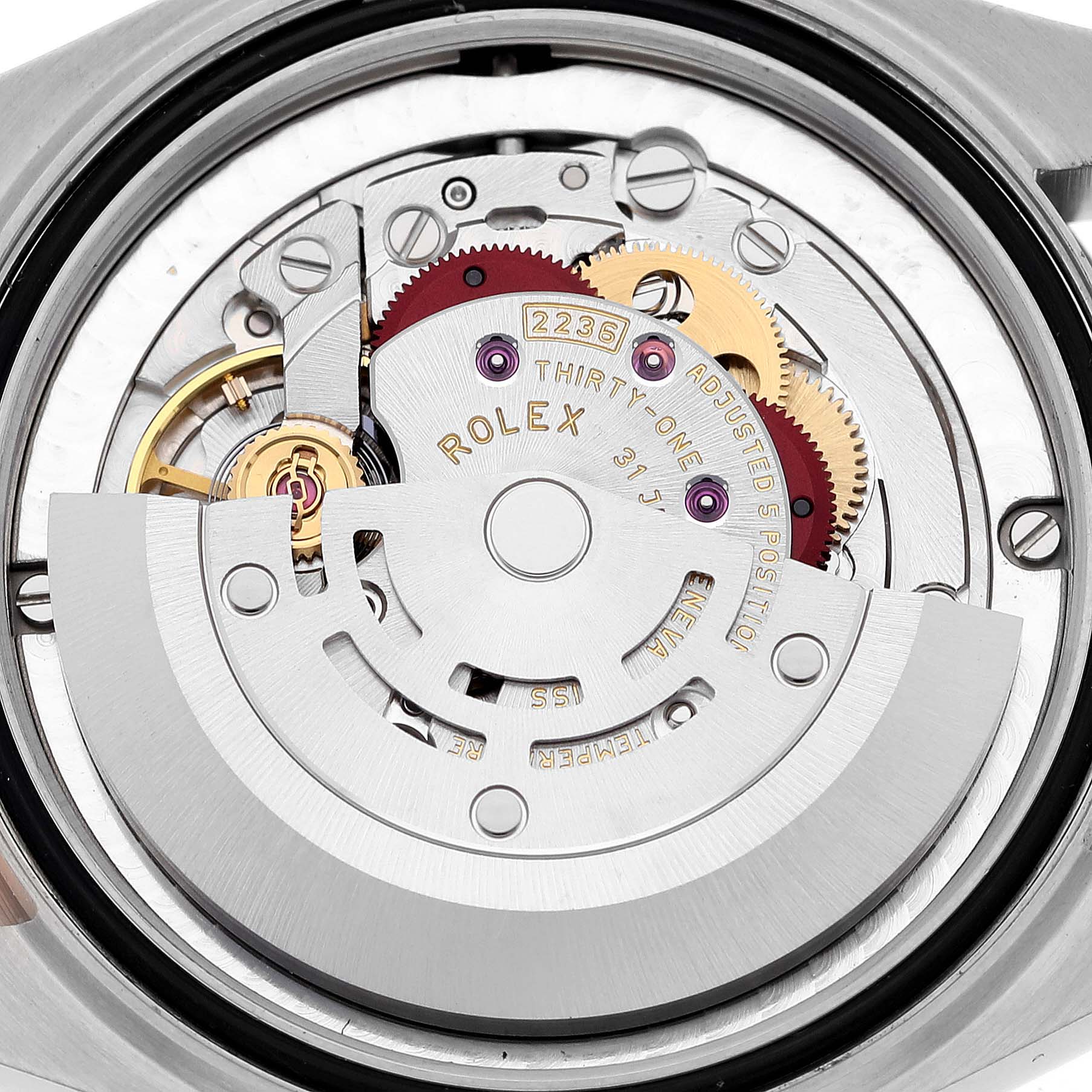 This image shows a close-up of the movement and inner mechanics of a Rolex Mid-Size 278241 Women's Steel and Gold (two tone) Grey Dial 278241 Women's Steel and Gold (two tone) Grey Dial model watch.