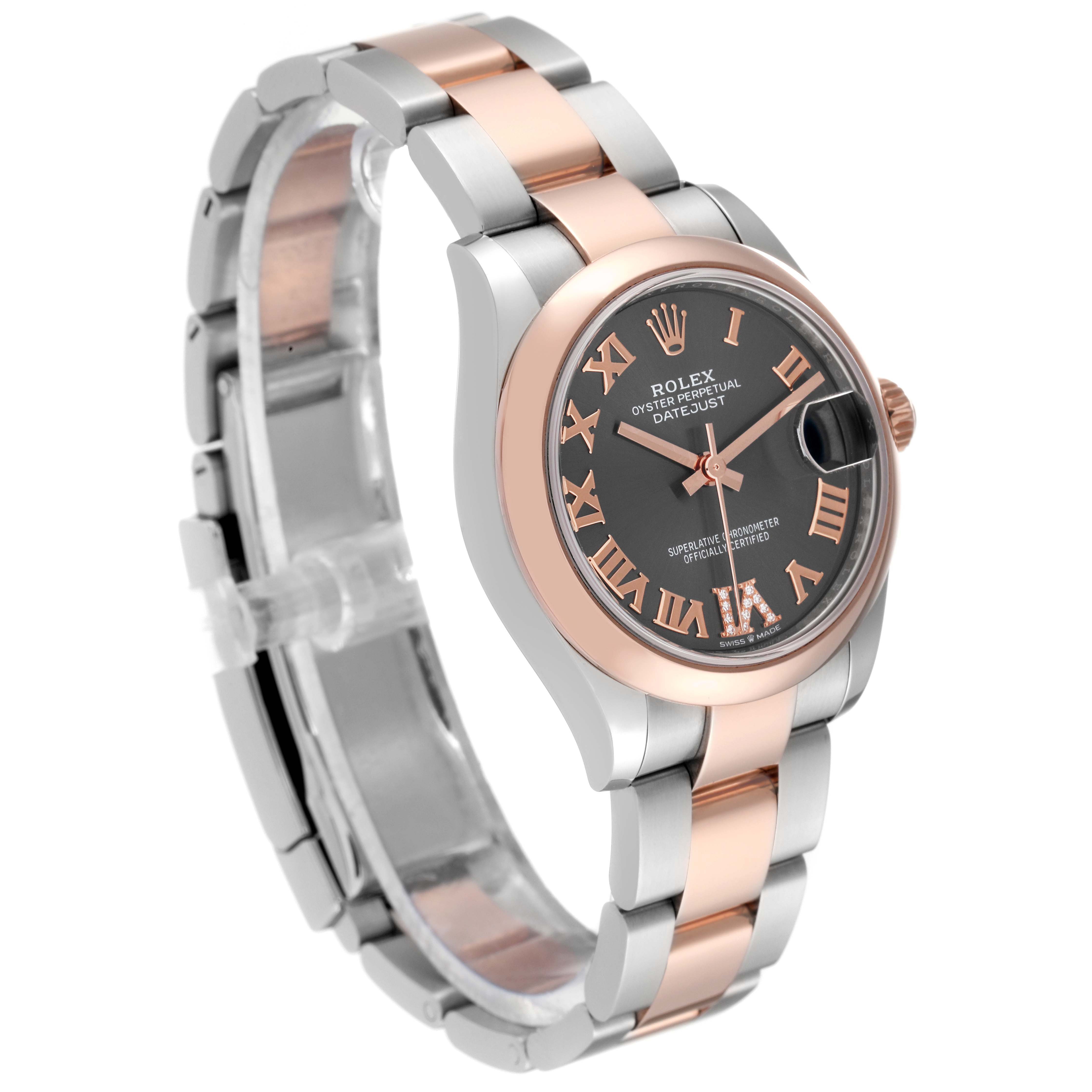 The Mid-Size Rolex watch is shown at a 3/4 angle, highlighting the face, bezel, case, and bracelet.