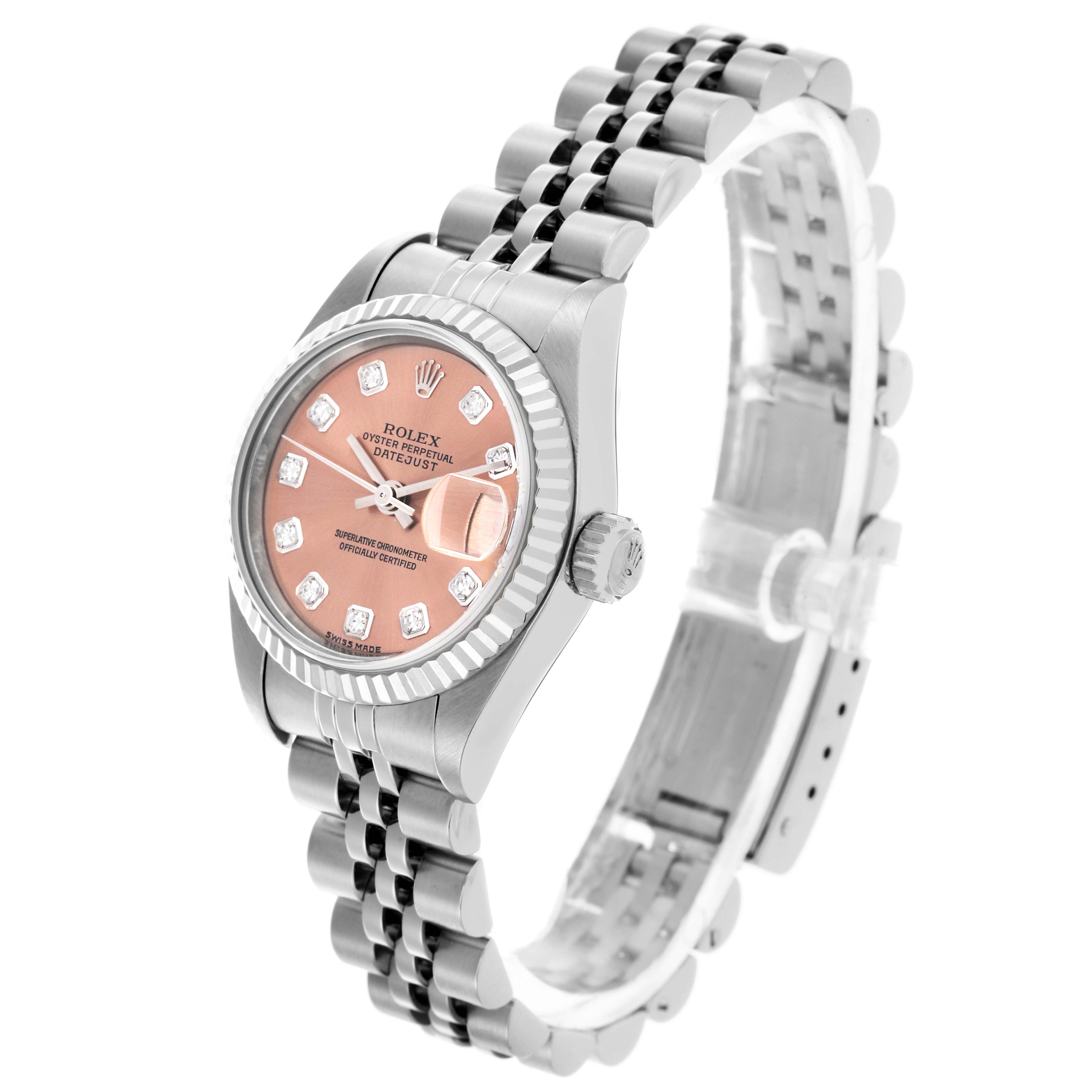The Rolex Datejust 79174 Women's Stainless Steel Pink Dial 79174 Women's Stainless Steel Pink Dial watch is shown at an angled view, highlighting the pink dial, bezel, crown, and jubilee bracelet.