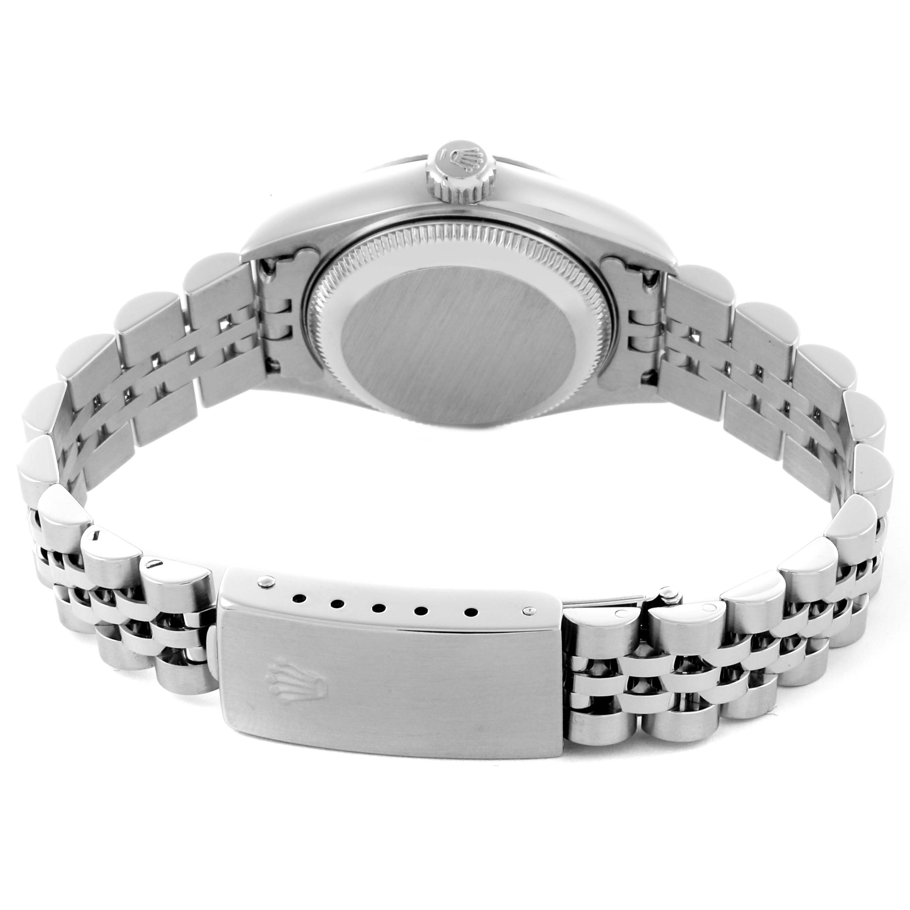 The image shows a rear view of the Rolex Datejust 79174 Women's Stainless Steel Pink Dial 79174 Women's Stainless Steel Pink Dial, focusing on the case back and bracelet clasp with the Rolex logo.