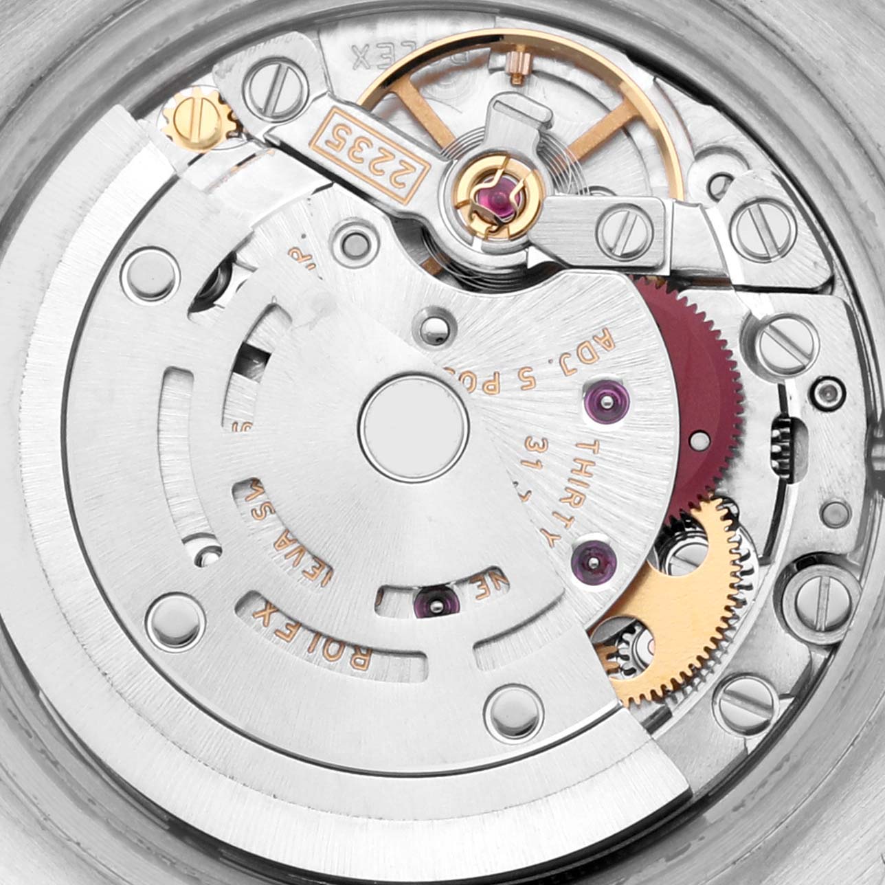 This image shows the intricate internal mechanical movement of a Rolex Datejust 179174 Women's Stainless Steel Silver Dial 179174 Women's Stainless Steel Silver Dial watch from a top-down angle.