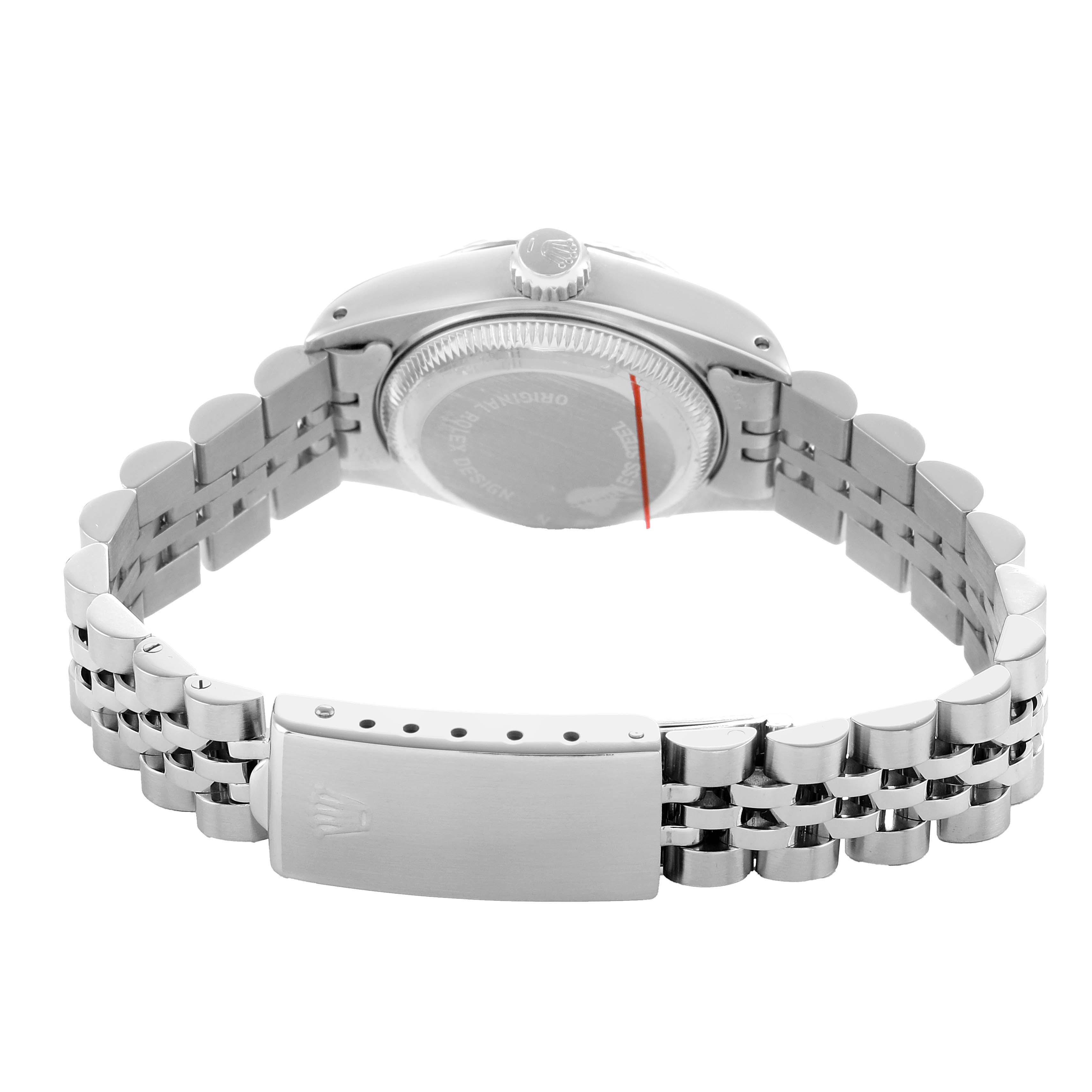 The image shows the back of a Rolex Datejust 69174 Women's Stainless Steel Silver Dial watch from a rear angle, highlighting the case back, crown, and jubilee bracelet.