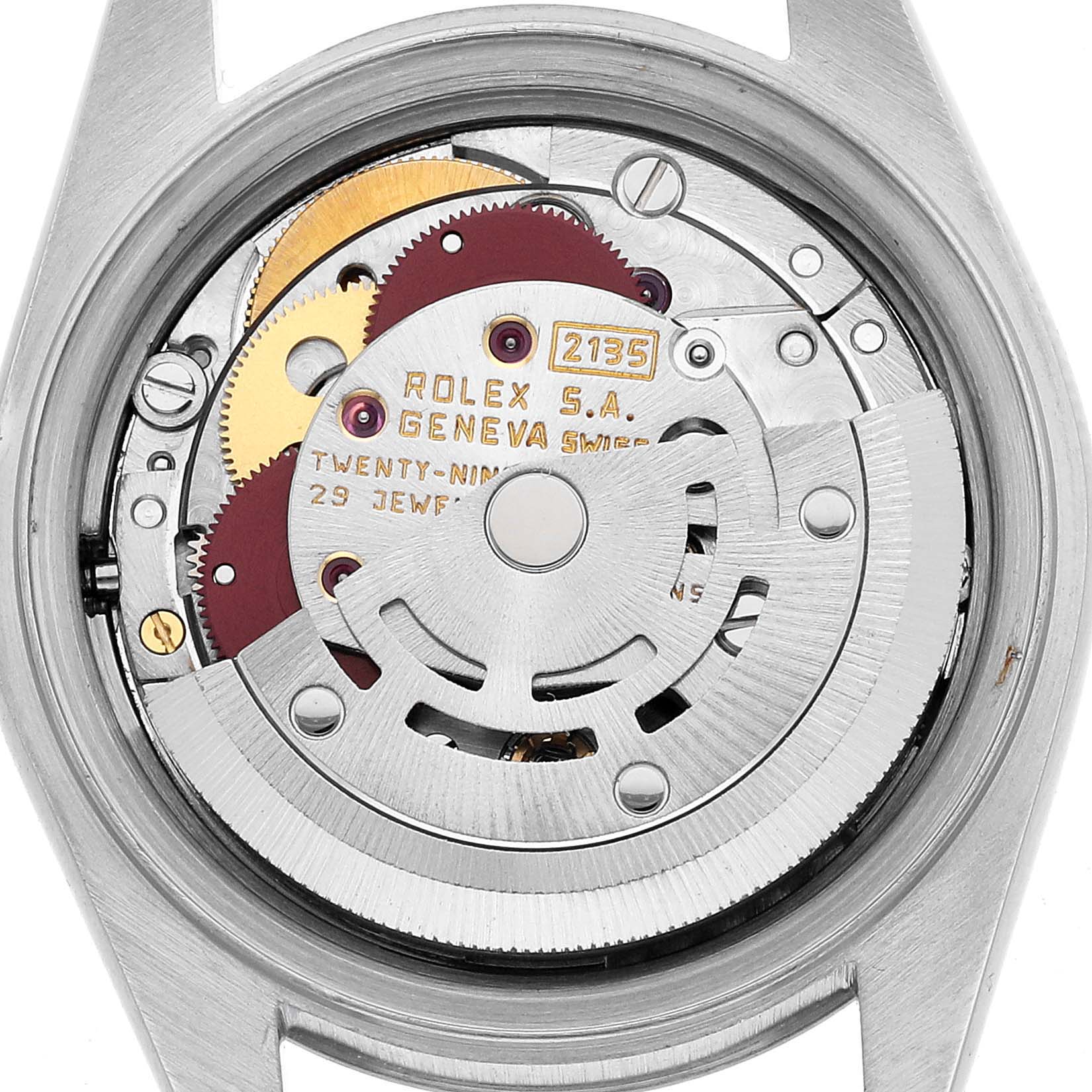 This image shows the back view of a Rolex Datejust 69174 Women's Stainless Steel Silver Dial, revealing its intricate movement components.