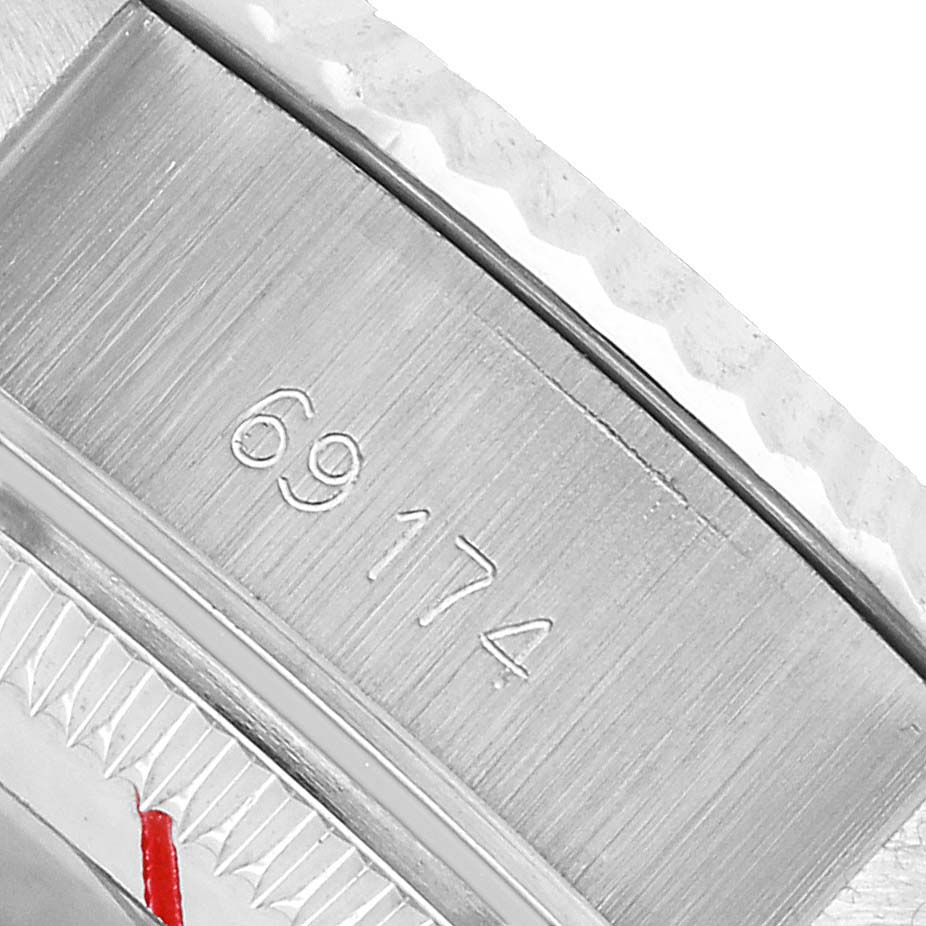 The image shows a close-up angle of the case side of a Rolex Datejust 69174 Women's Stainless Steel Silver Dial, highlighting the engraved reference number.