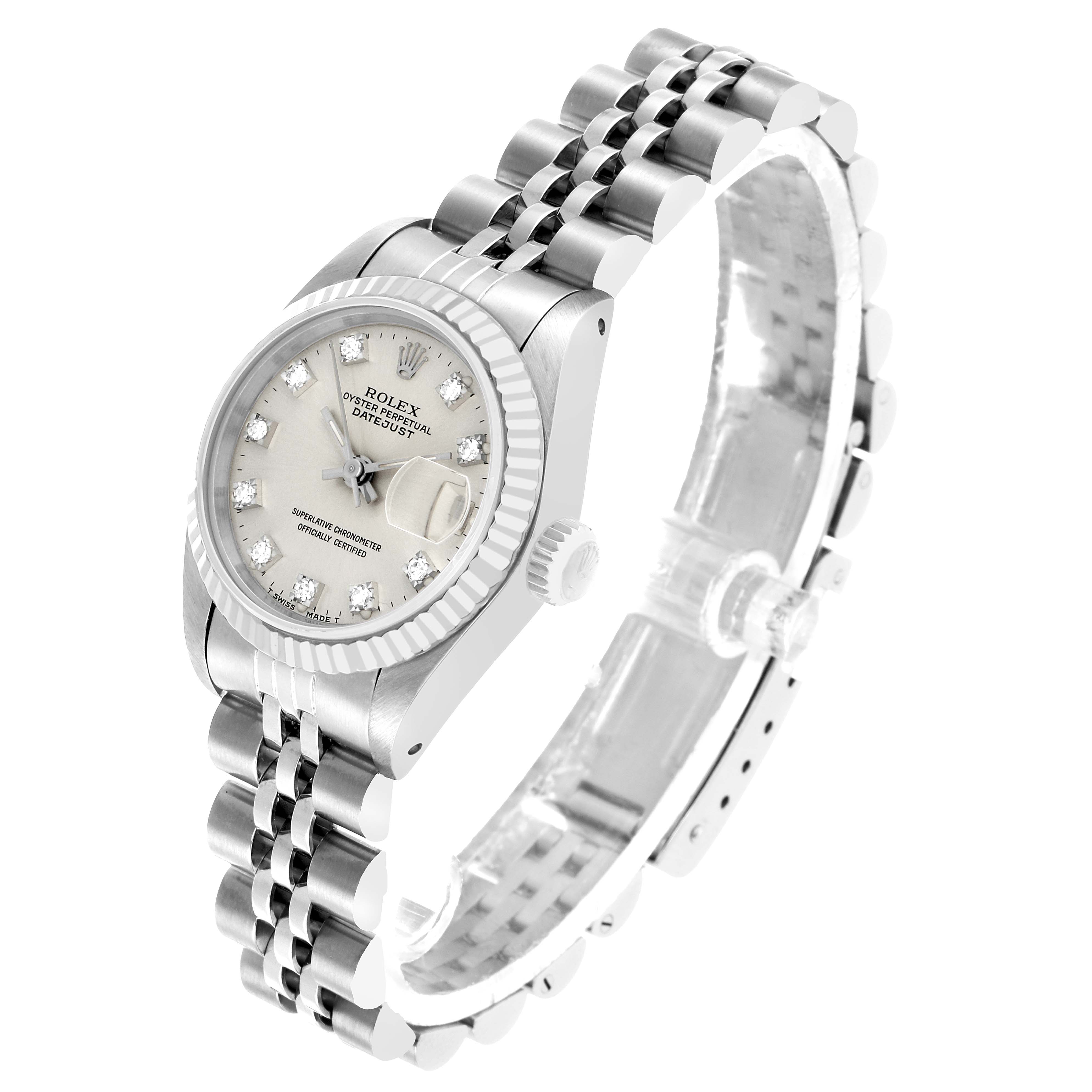 The Rolex Datejust 69174 Women's Stainless Steel Silver Dial watch is shown at an angled side view, revealing its face, bezel, crown, and Jubilee bracelet.