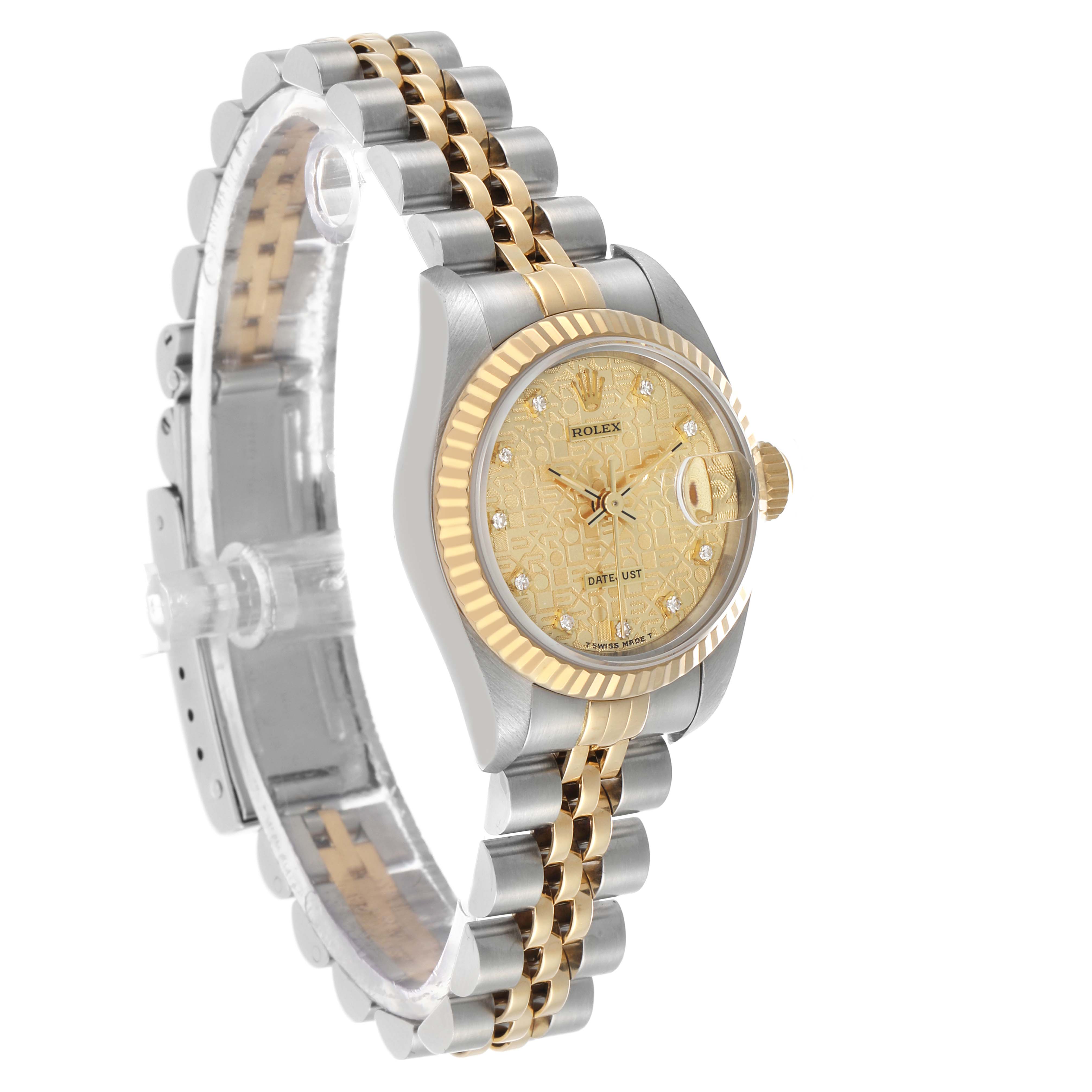 The Rolex Datejust 69173 Women's Steel and Gold (two tone) Champagne Dial watch is shown at an angled view, highlighting the dial, fluted bezel, and Jubilee bracelet.