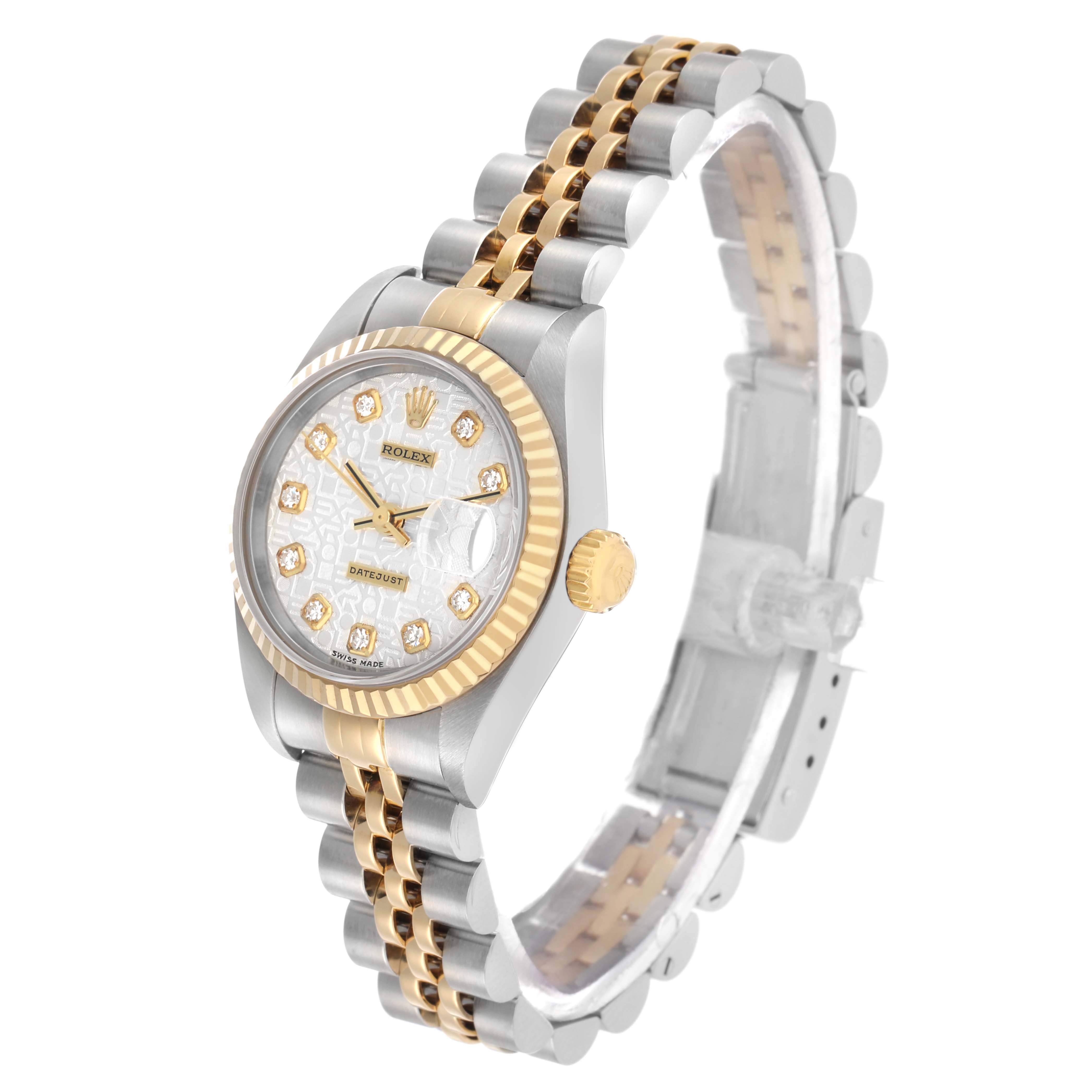 The Rolex Datejust 79173 Women's Steel and Gold (two tone) Silver Dial watch is shown at an angled side view, highlighting its face, fluted bezel, crown, and two-tone bracelet.