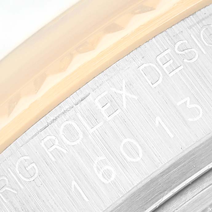 The close-up image shows the engraved bezel and case edge of the Rolex Vintage Collection 16013 Men's Steel and Gold (two tone) Blue Dial 16013 Men's Steel and Gold (two tone) Blue Dial model.