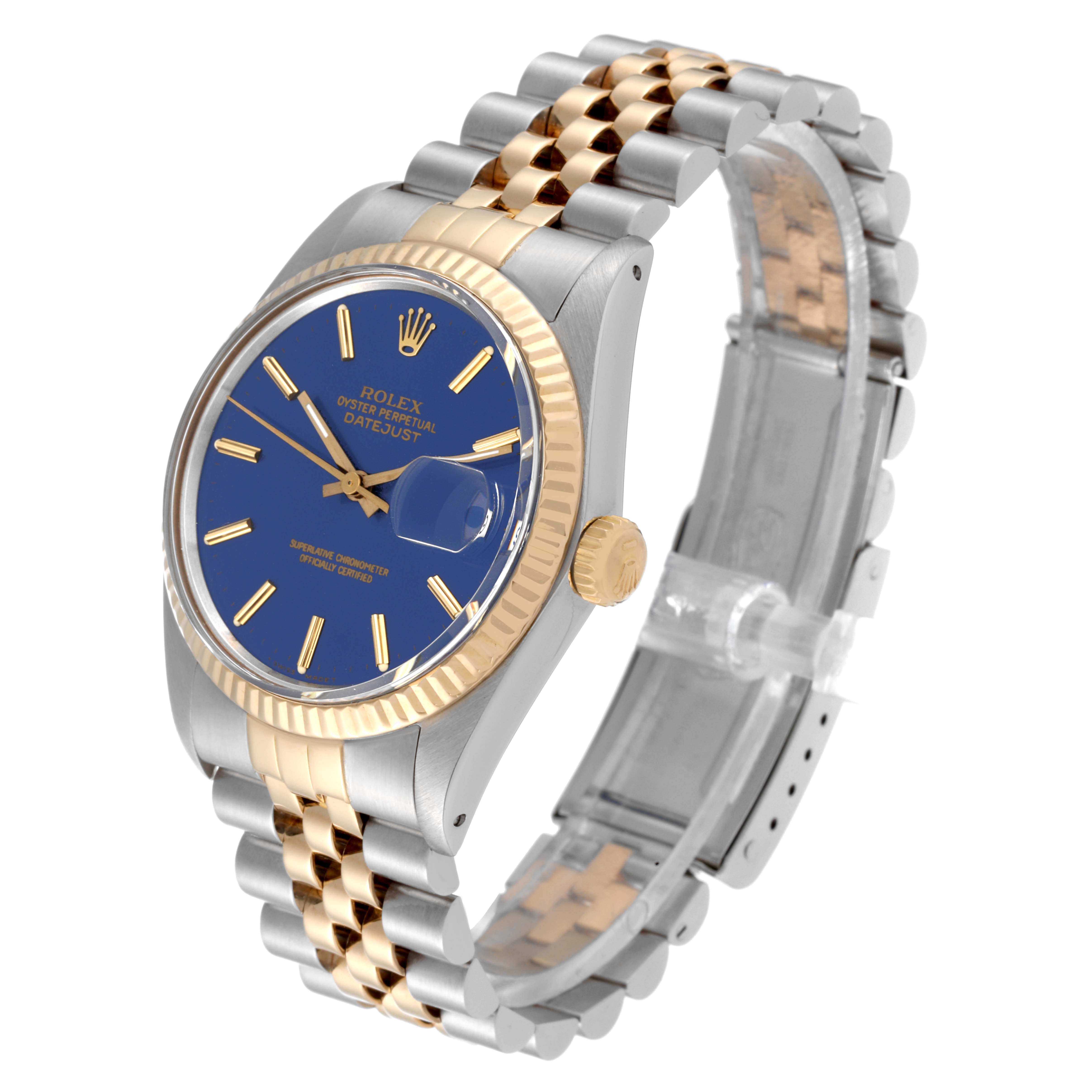 The image shows a Rolex Vintage Collection 16013 Men's Steel and Gold (two tone) Blue Dial 16013 Men's Steel and Gold (two tone) Blue Dial Datejust watch from an angled view, highlighting its blue dial, fluted bezel, and Jubilee bracelet.