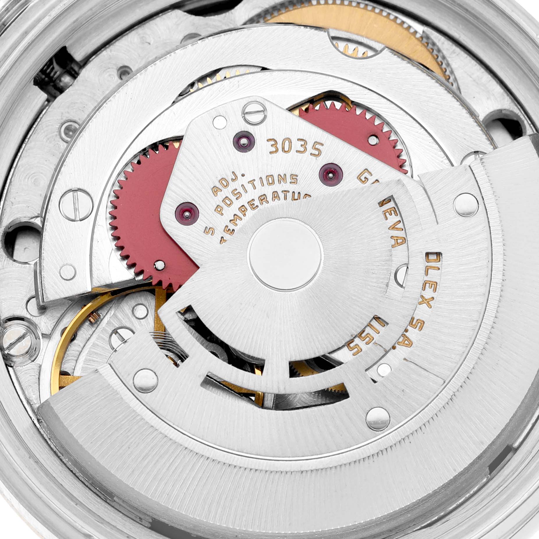 This image shows a close-up view of the movement mechanism inside a Vintage Collection Rolex watch.