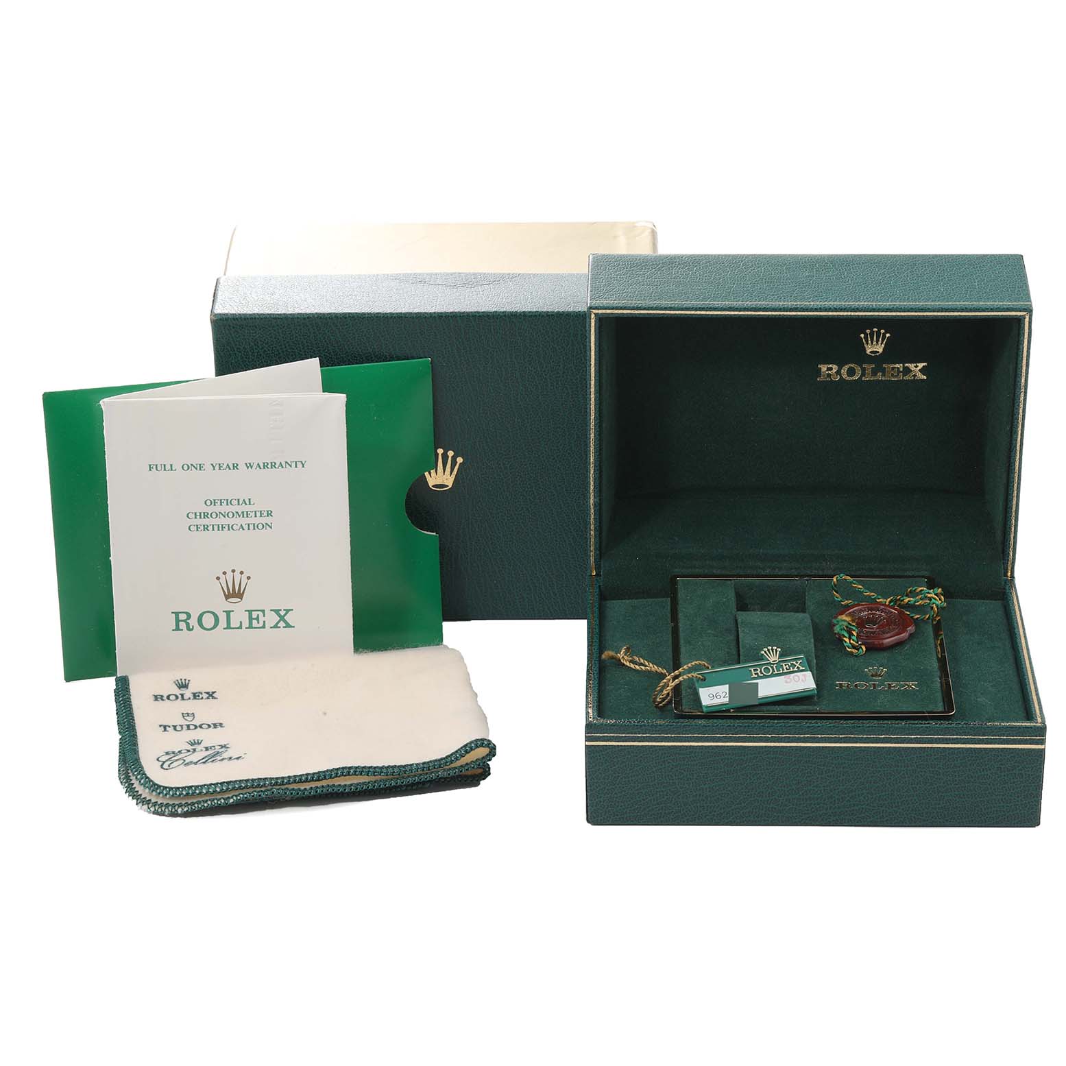 Displayed are the Rolex Vintage Collection 16013 Men's Steel and Gold (two tone) Blue Dial 16013 Men's Steel and Gold (two tone) Blue Dial watch box, warranty card, cleaning cloth, and tags from a front angle.