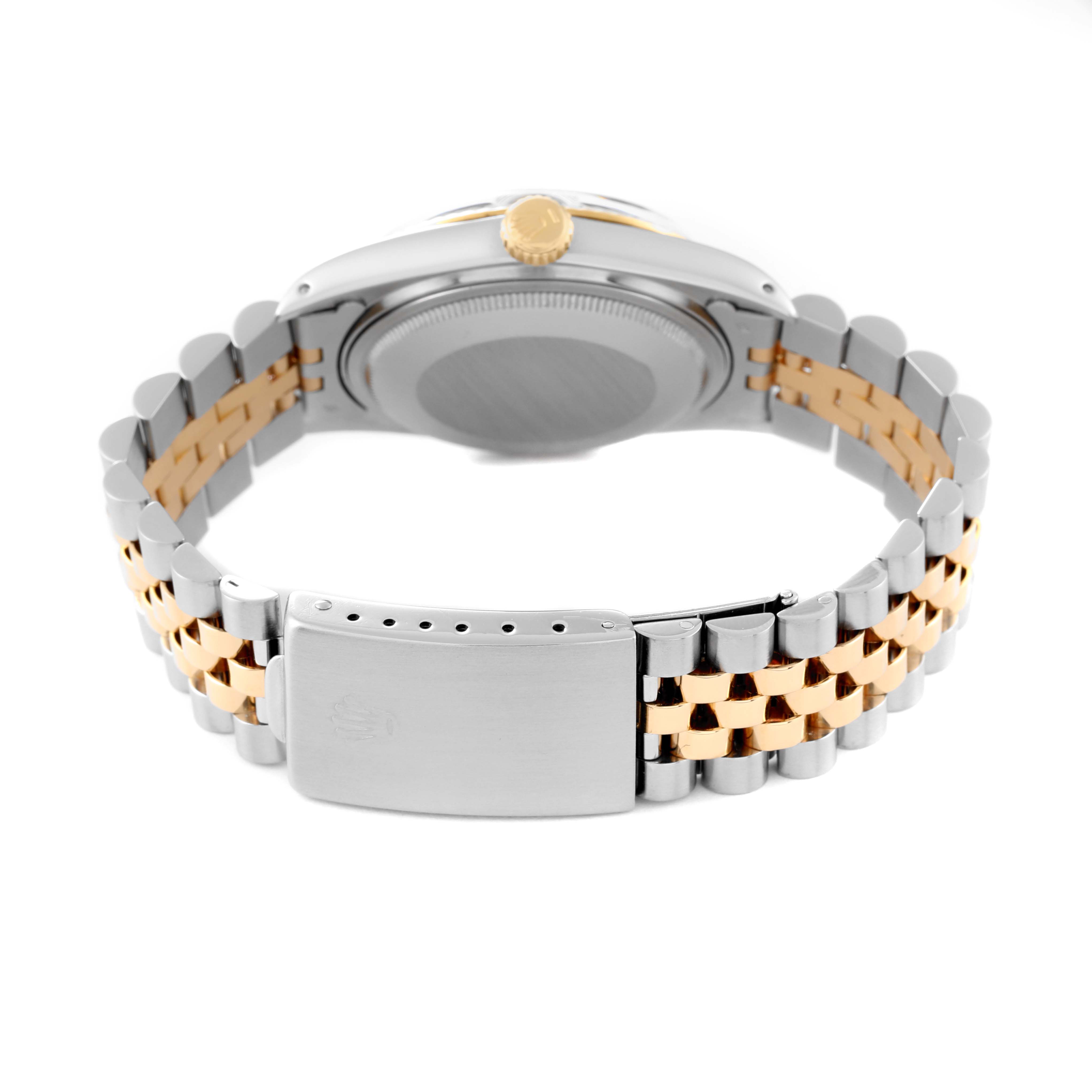 The image shows the back view of a Vintage Collection Rolex watch, highlighting the clasp, bracelet, and case back.