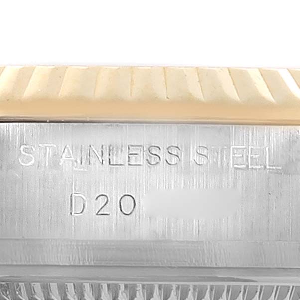 The image shows a close-up of the case side, highlighting the "STAINLESS STEEL" engraving on a Rolex Datejust 179173 Women's Steel and Gold (two tone) Blue Dial 179173 Women's Steel and Gold (two tone) Blue Dial.