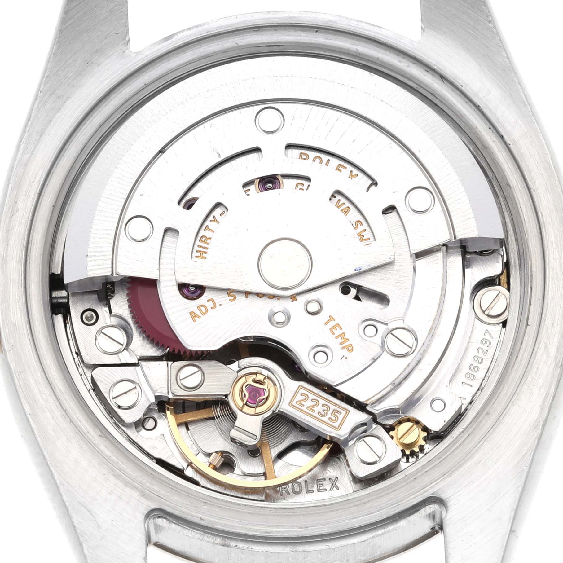 The image shows the internal mechanical movement of a Rolex Datejust 179173 Women's Steel and Gold (two tone) Blue Dial 179173 Women's Steel and Gold (two tone) Blue Dial watch from the back angle.